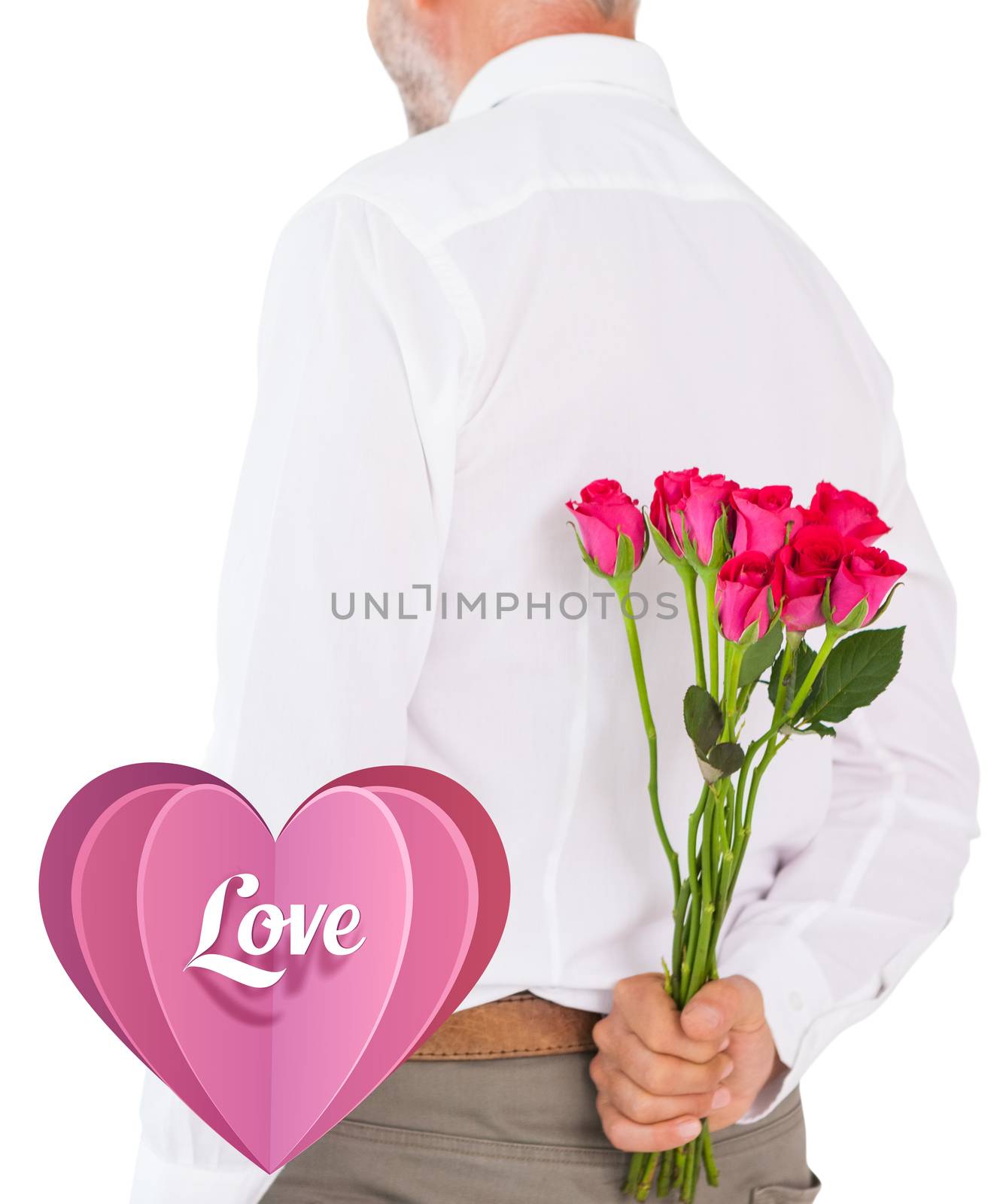 Man holding bouquet of roses behind back against love heart