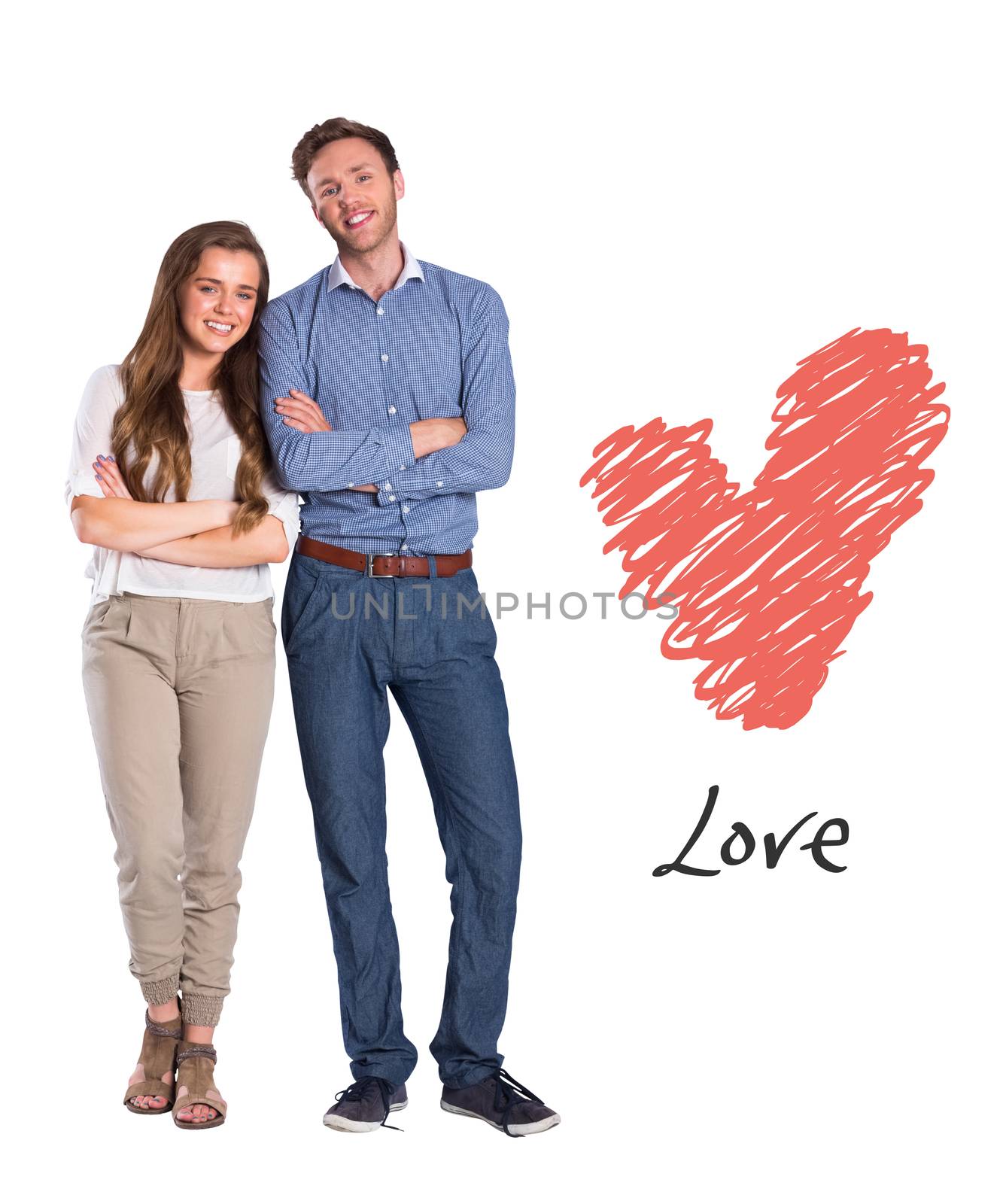 Smiling young couple with arms crossed against love heart