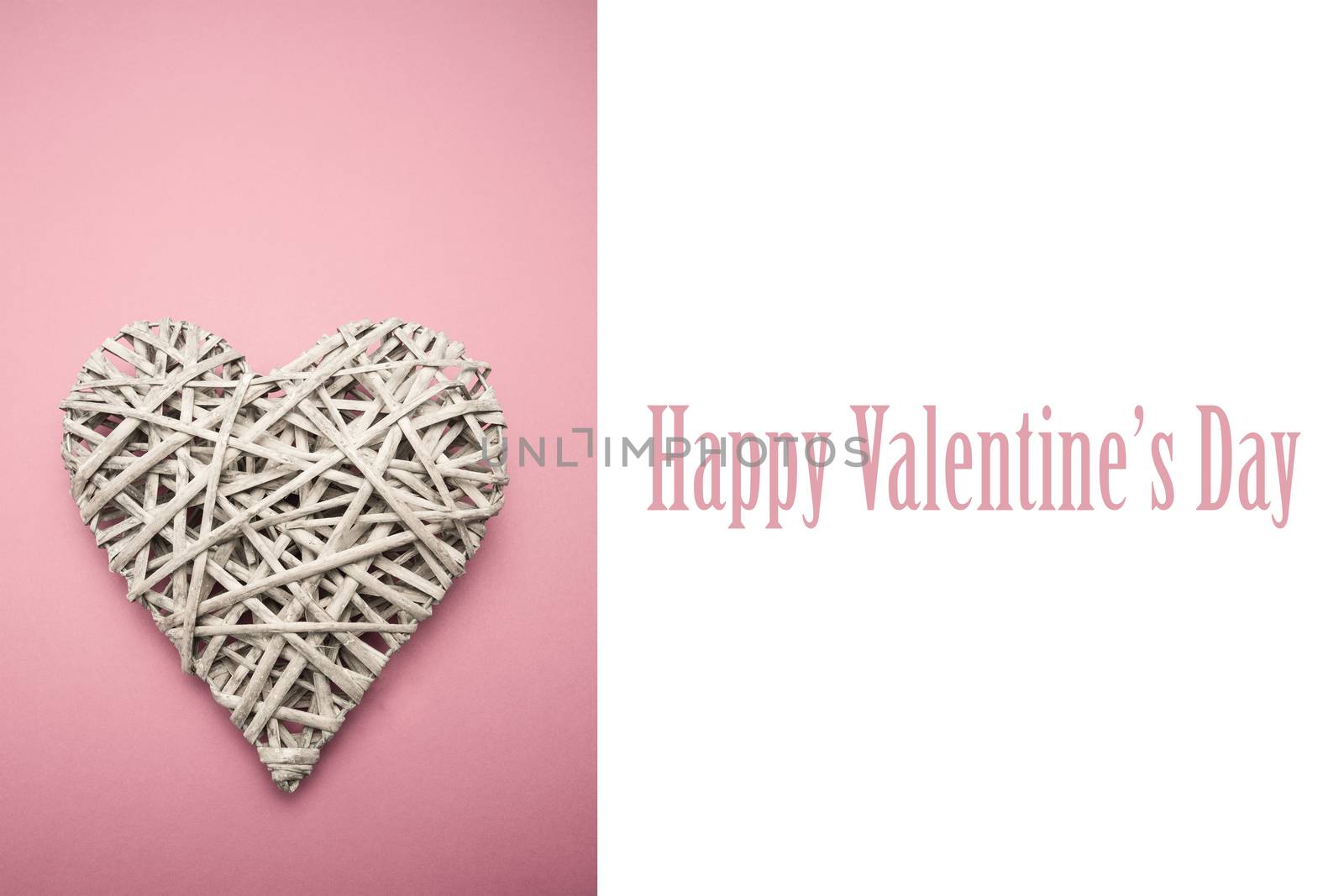 Wicker heart ornament against cute valentines message