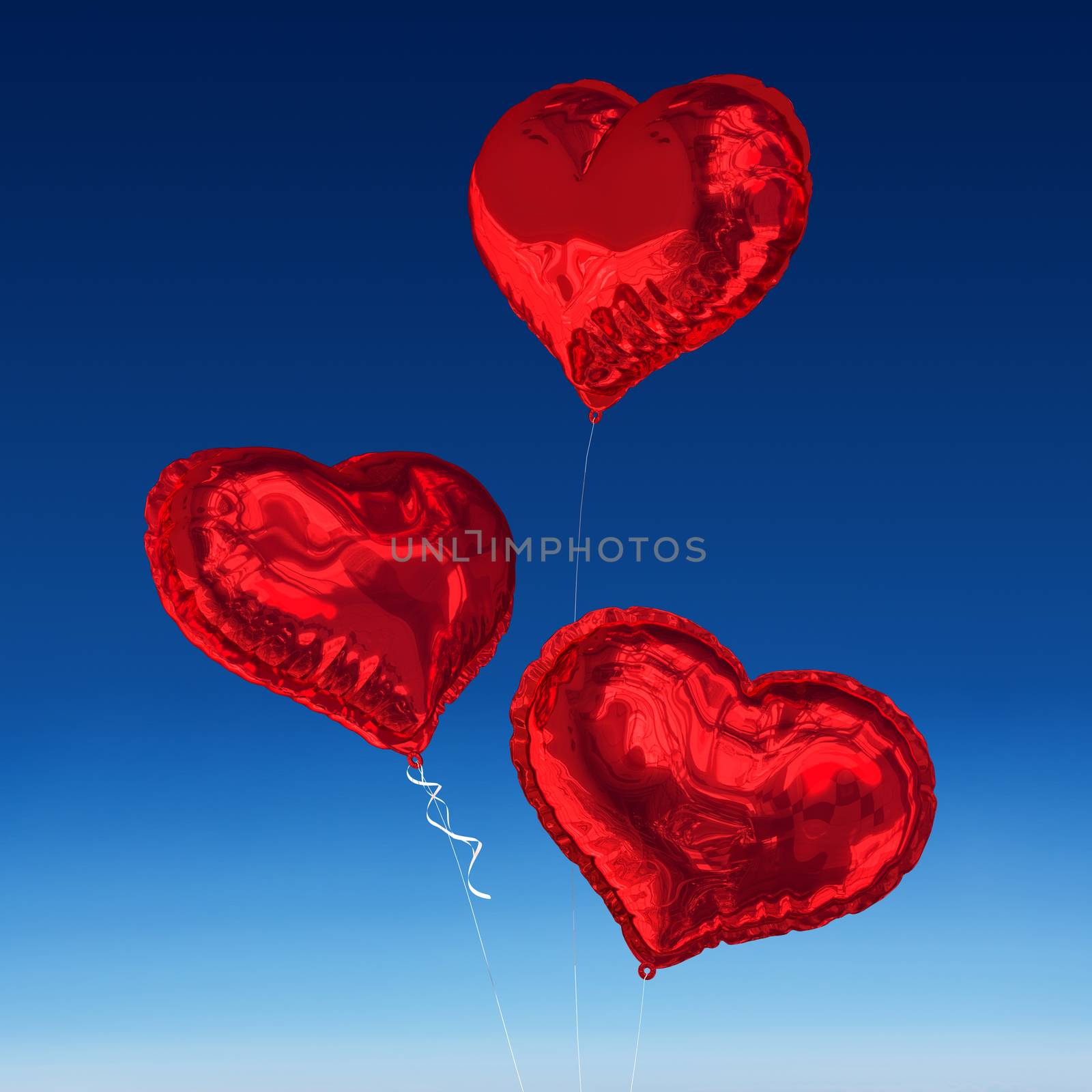 Love heart balloons against blue sky