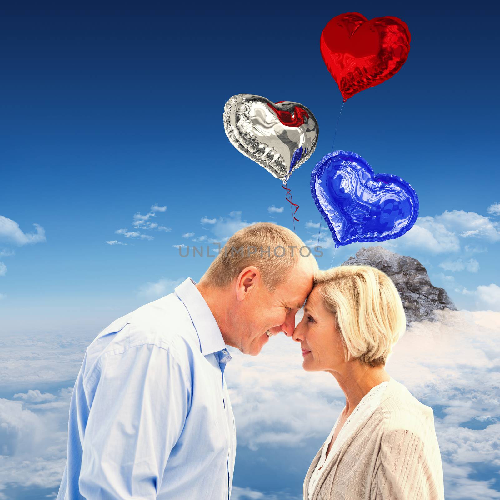 Composite image of happy mature couple facing each other by Wavebreakmedia