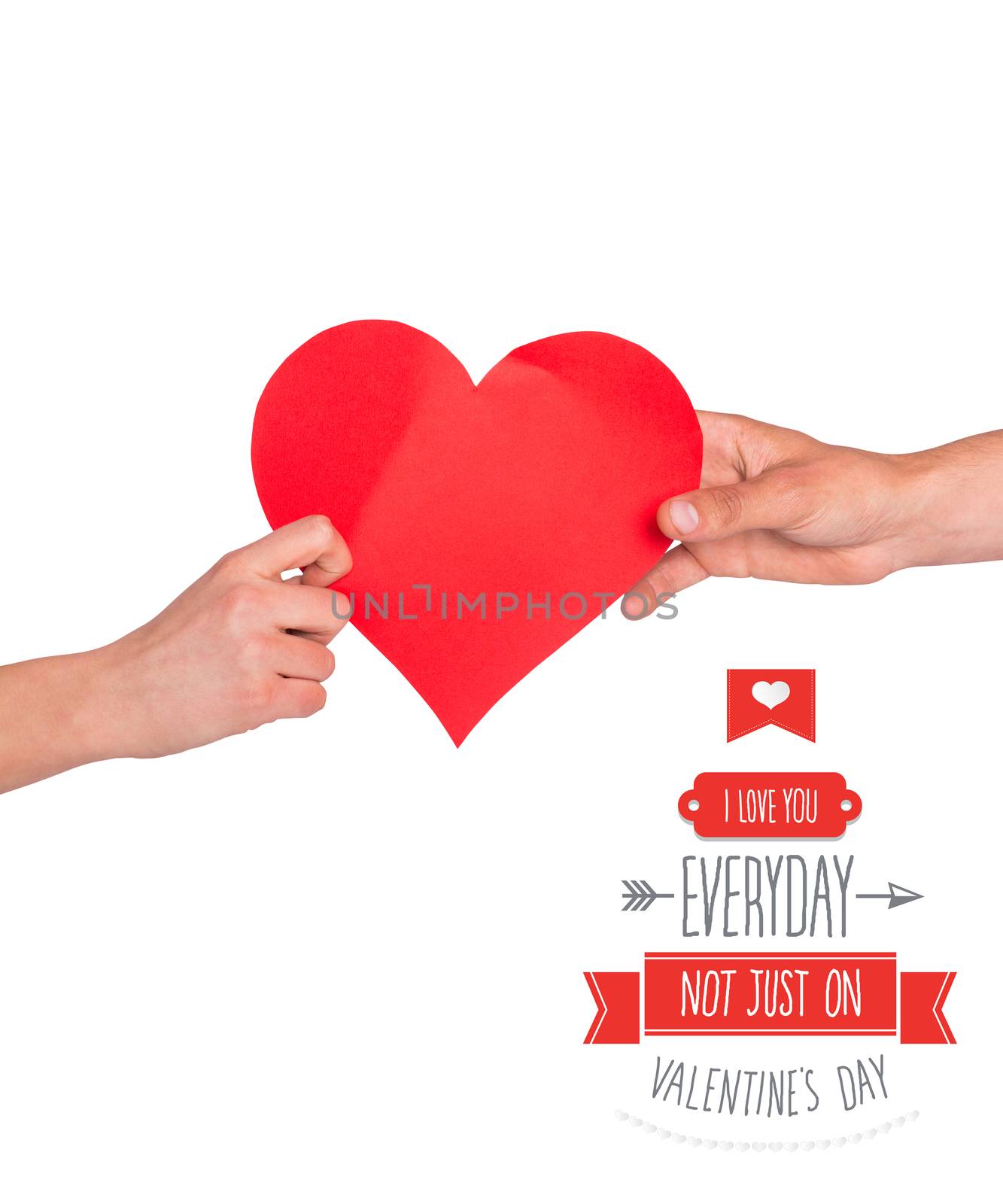 Composite image of hands holding red heart by Wavebreakmedia