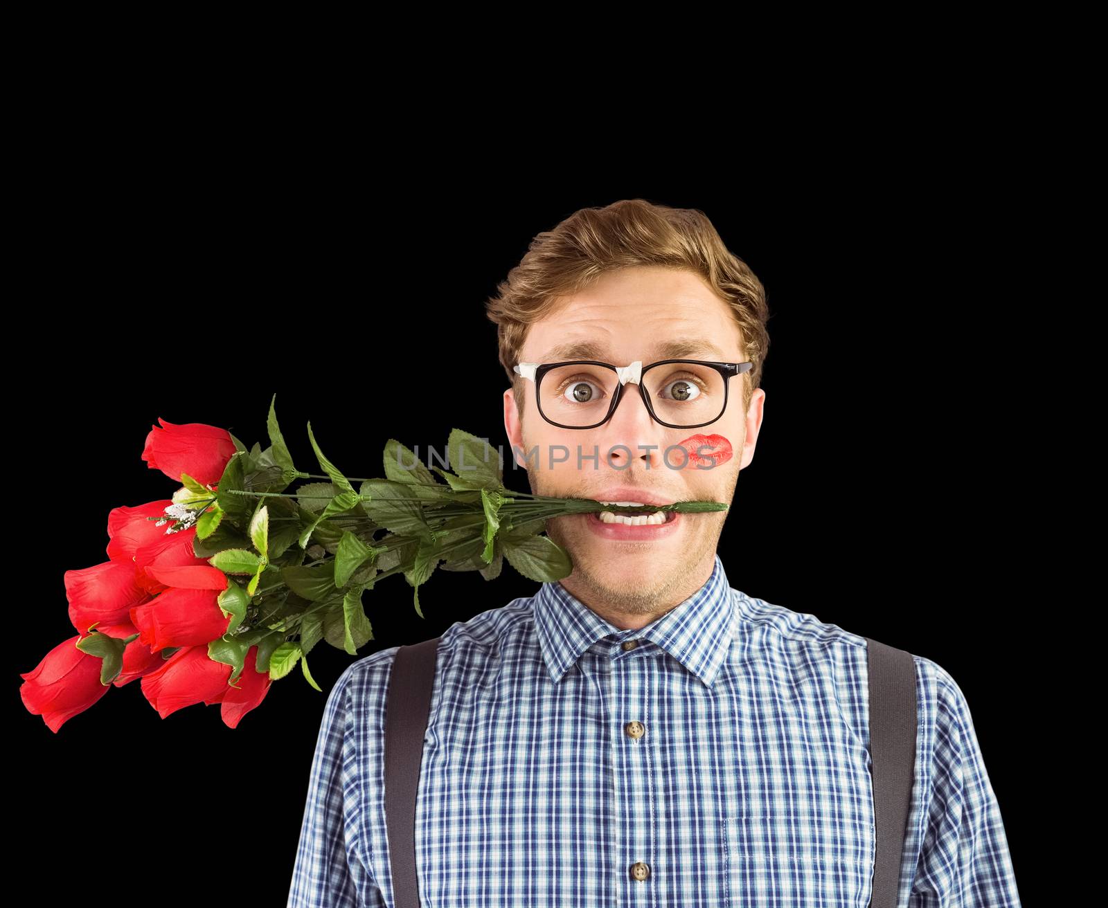 Geeky hipster biting a bunch of roses against black