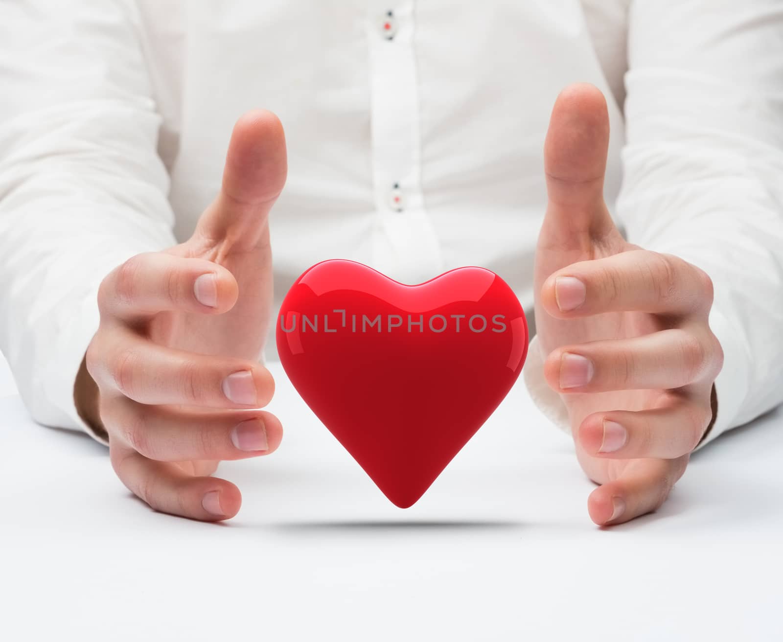 Hands holding against white background with vignette
