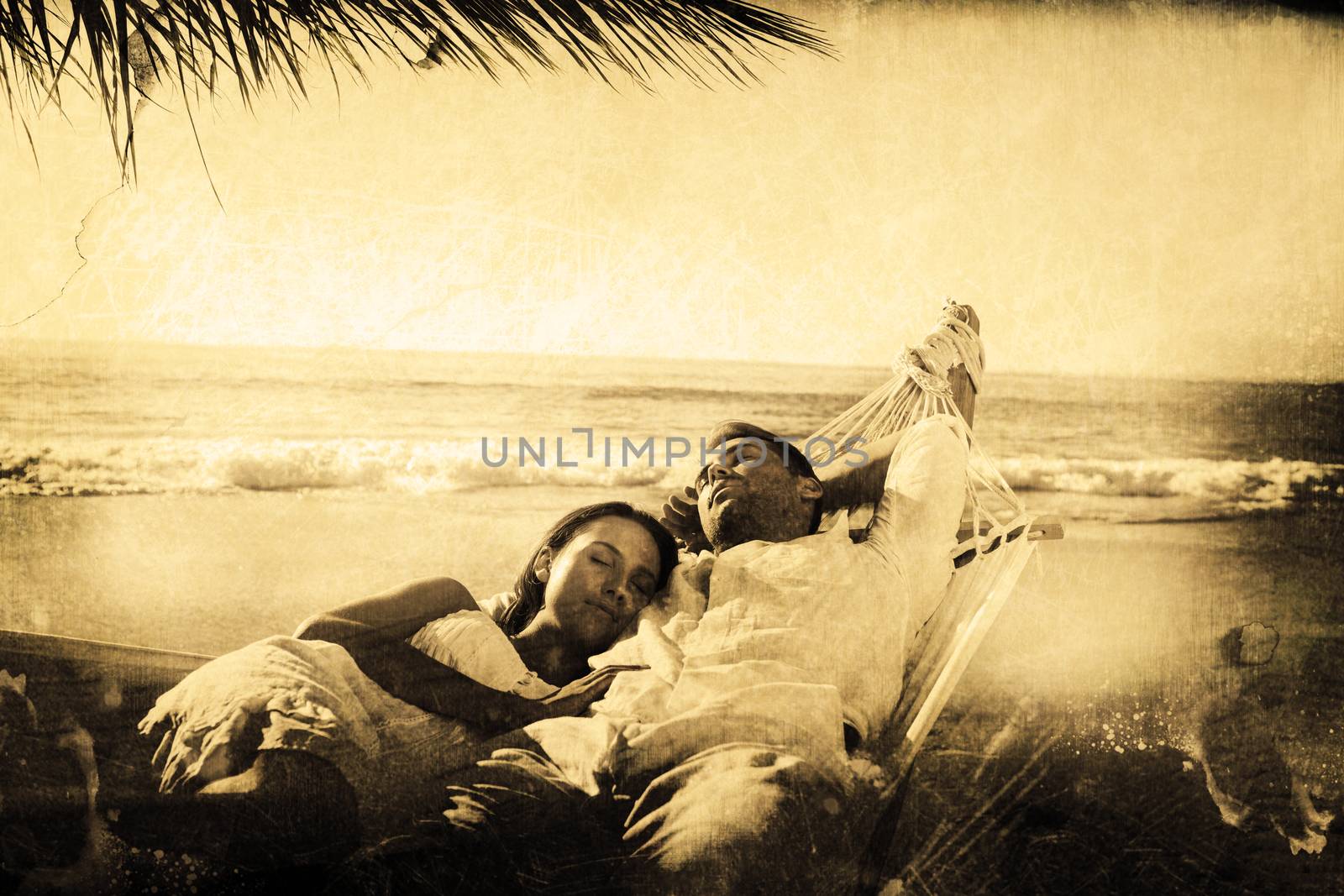 Calm couple napping in a hammock against grey background