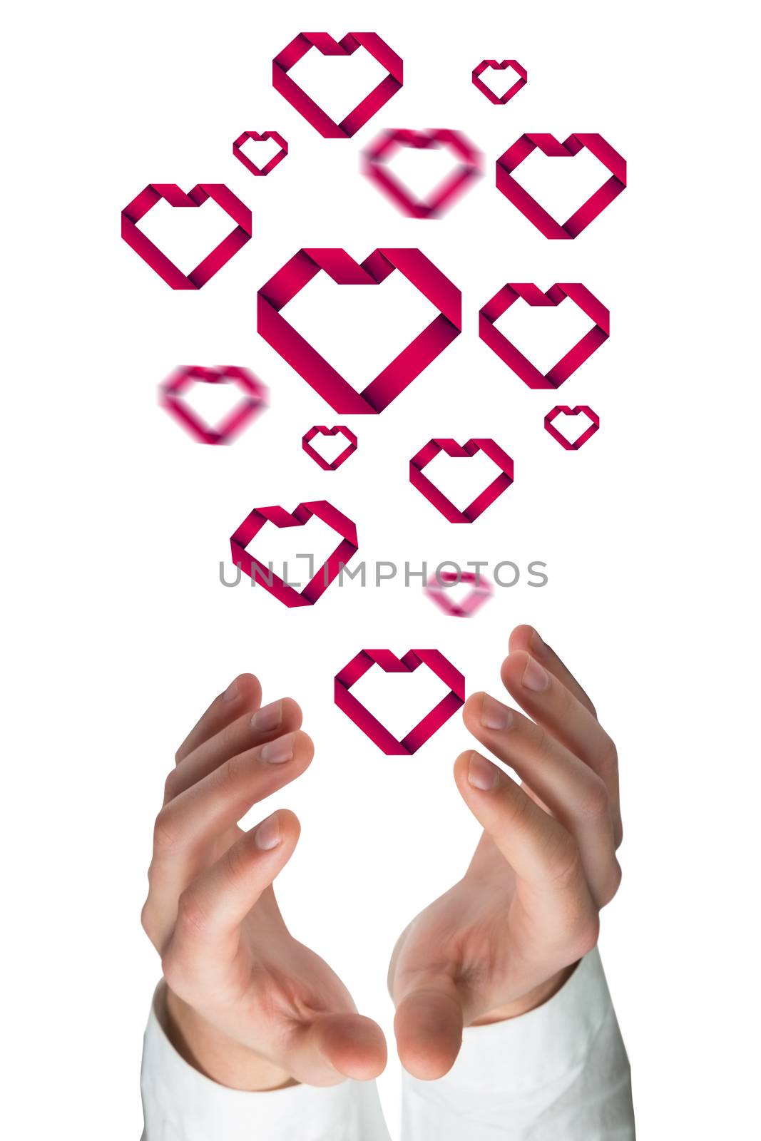 Hands holding against heart