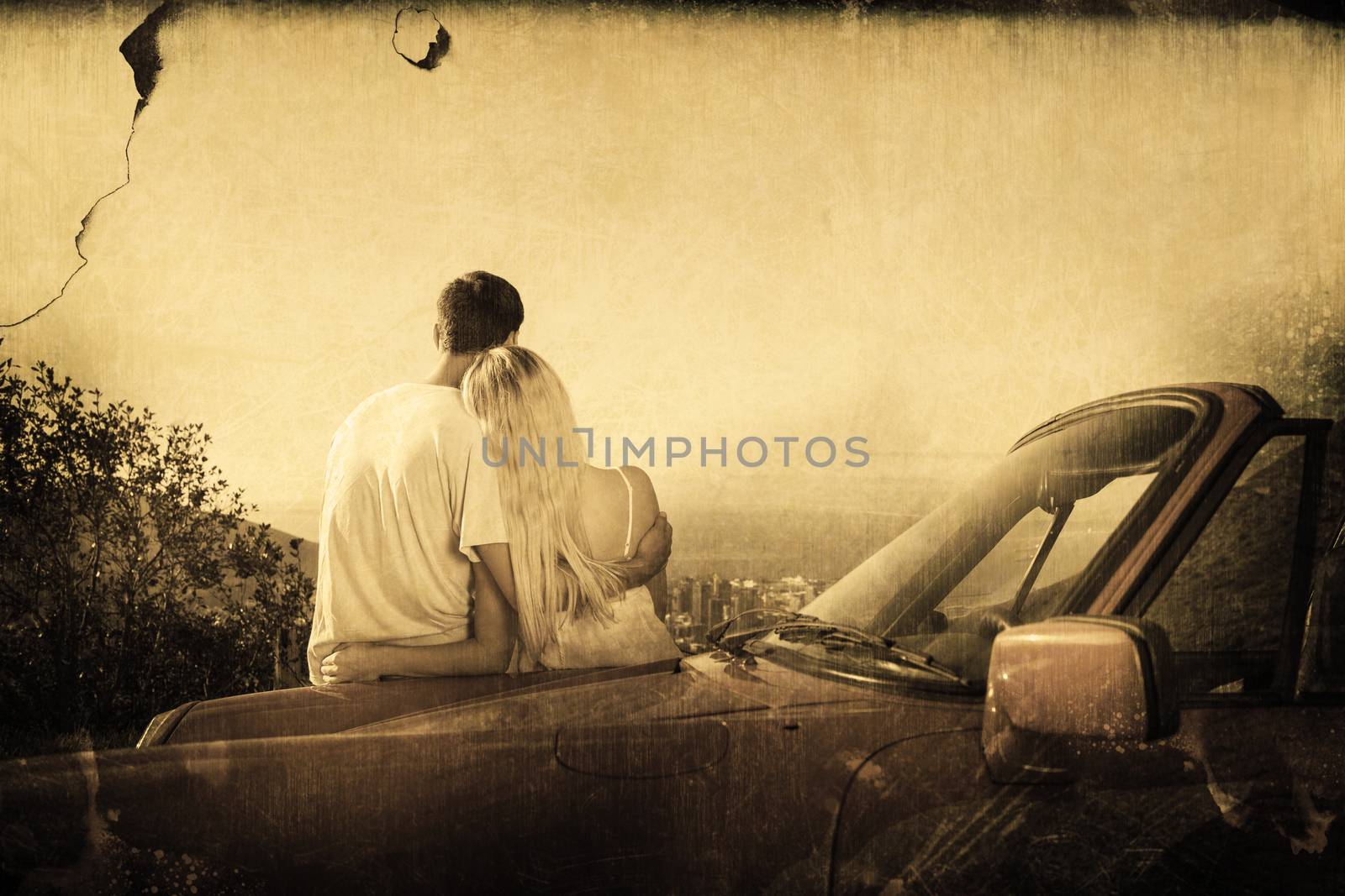 Composite image of rear view of couple hugging and admiring panorama by Wavebreakmedia