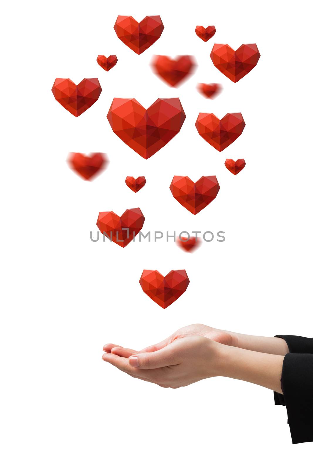 Businesswomans hands presenting against heart