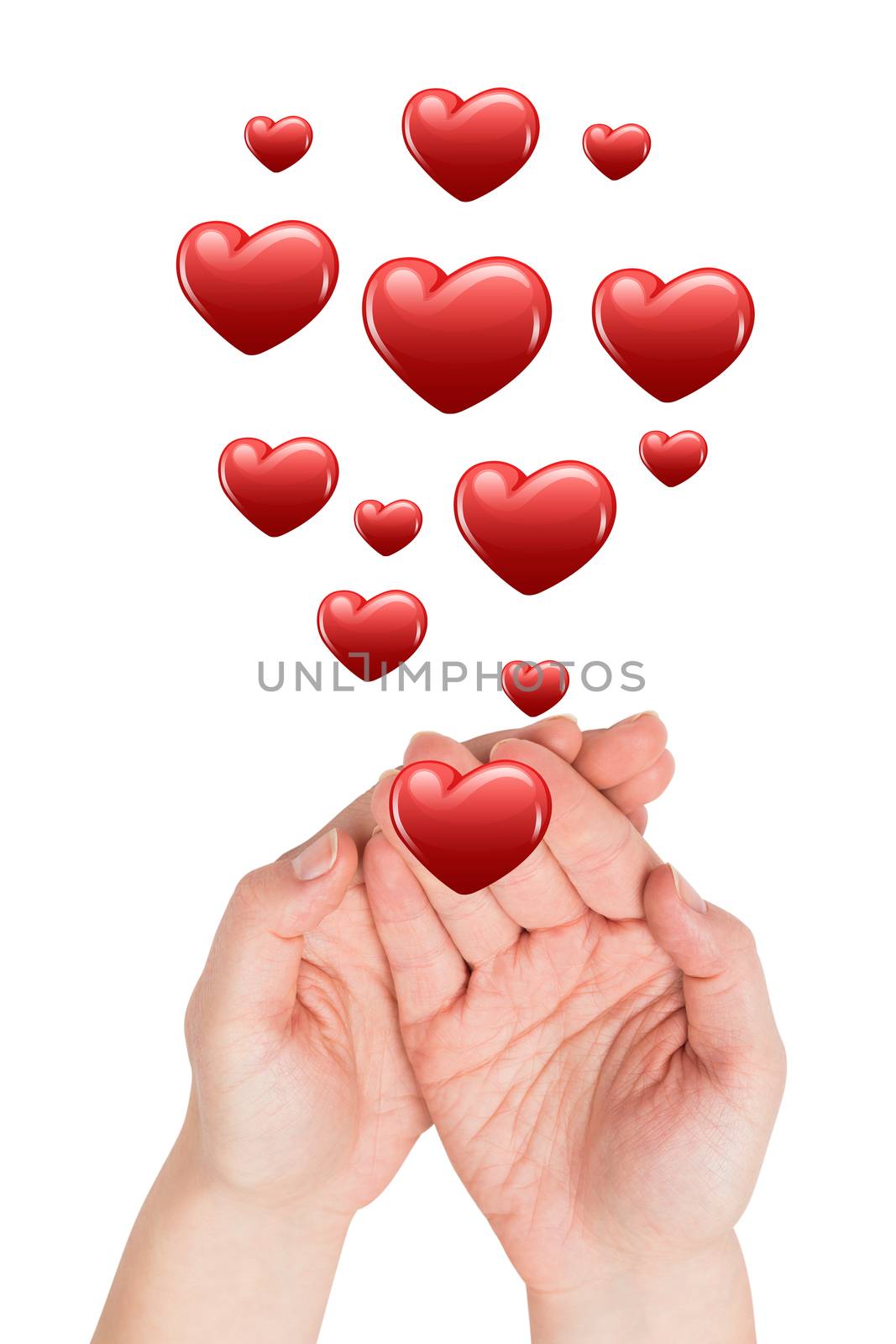 Hands presenting against heart