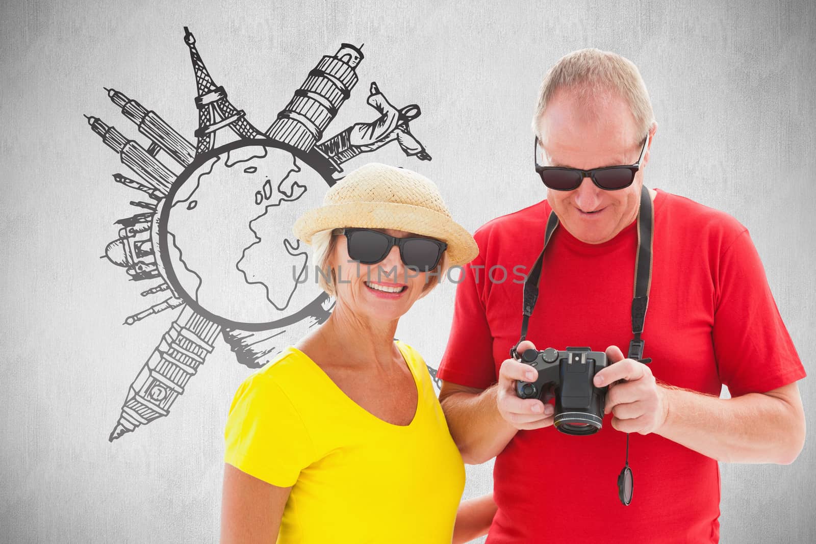 Composite image of happy mature couple wearing sunglasses by Wavebreakmedia