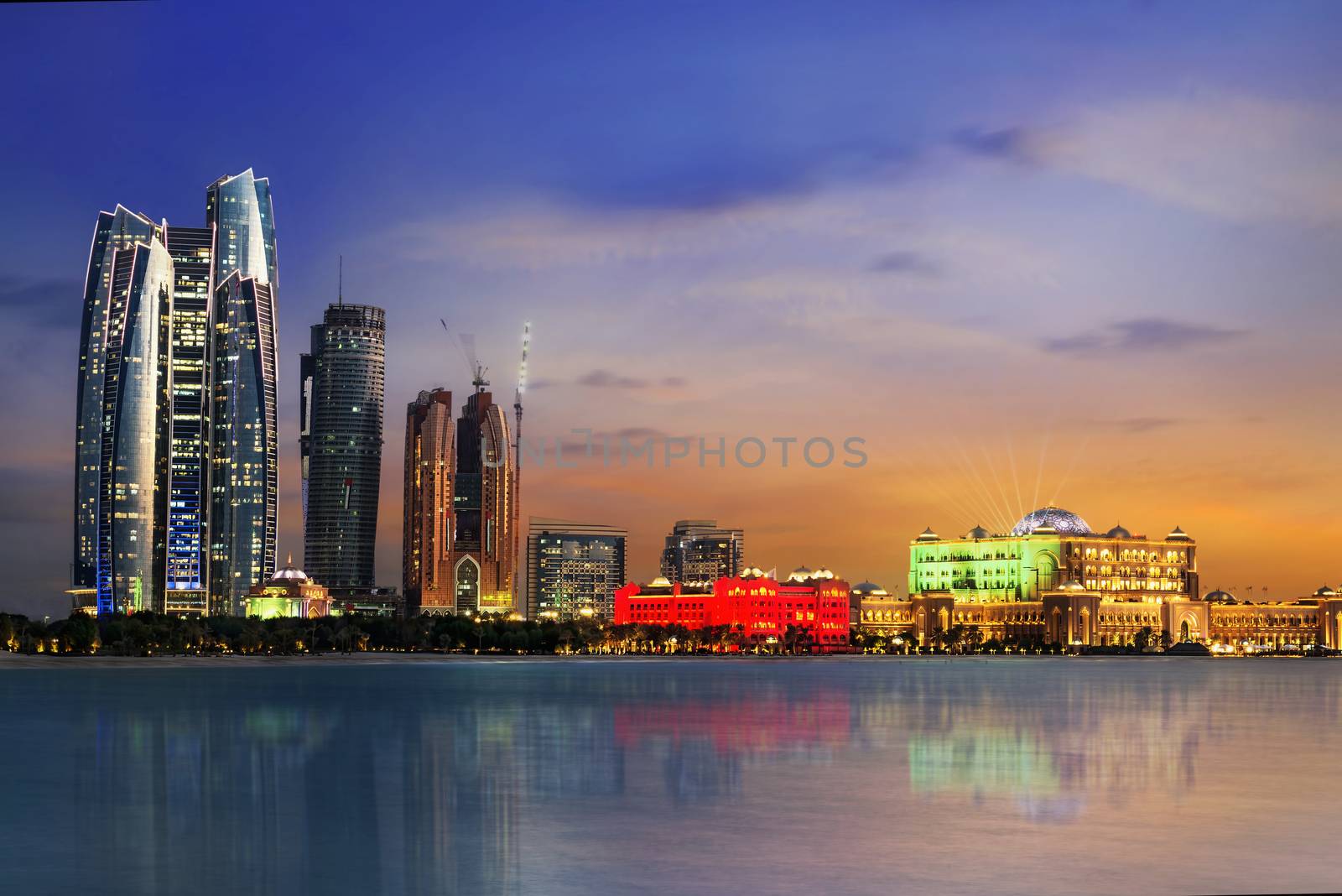 Panorama of Abu Dhabi at night, capital of United Arab Emirates 