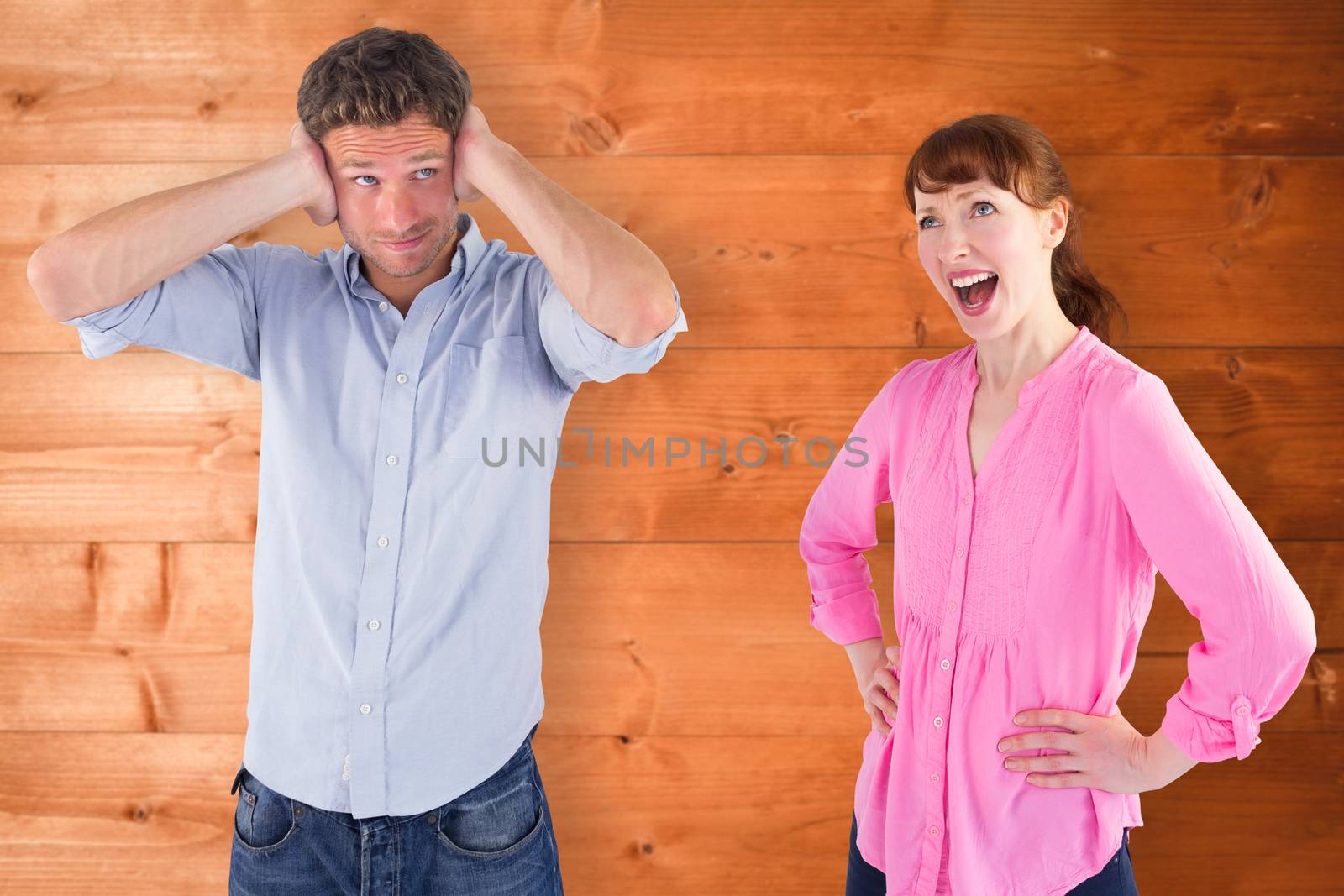 Composite image of woman arguing with ignoring man by Wavebreakmedia