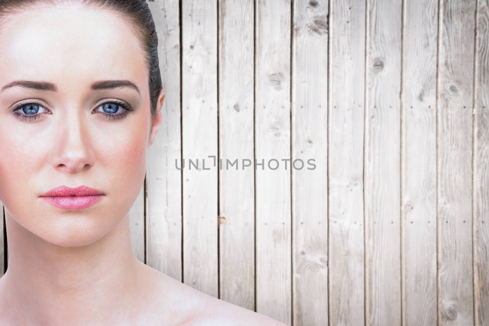 Natural beauty posing against wooden planks