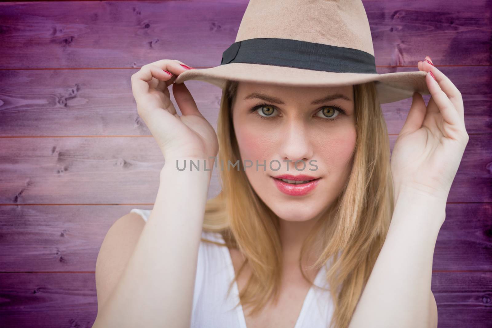 Pretty hipster blonde against wooden planks background