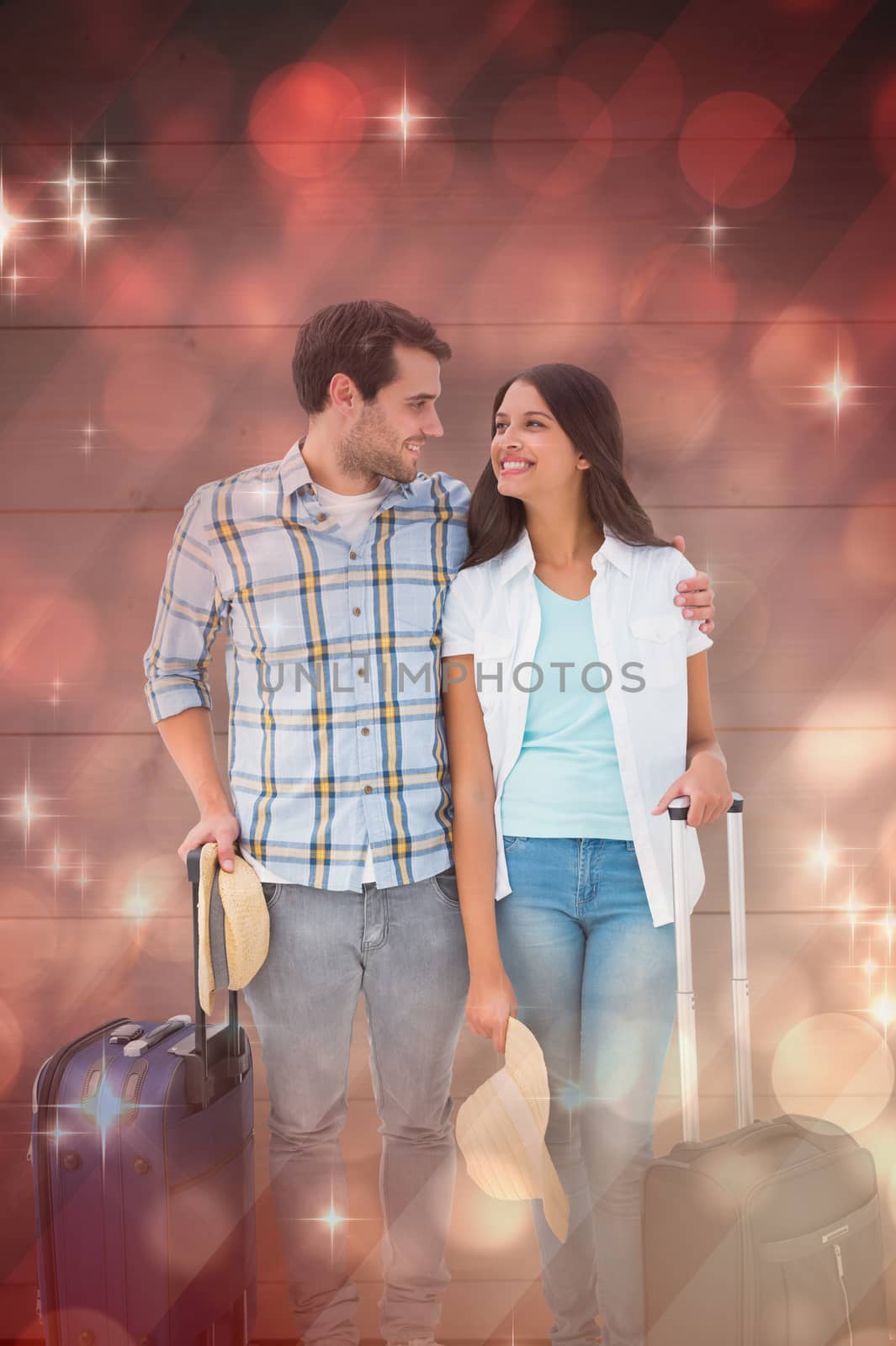 Attractive young couple going on their holidays against light design shimmering on red