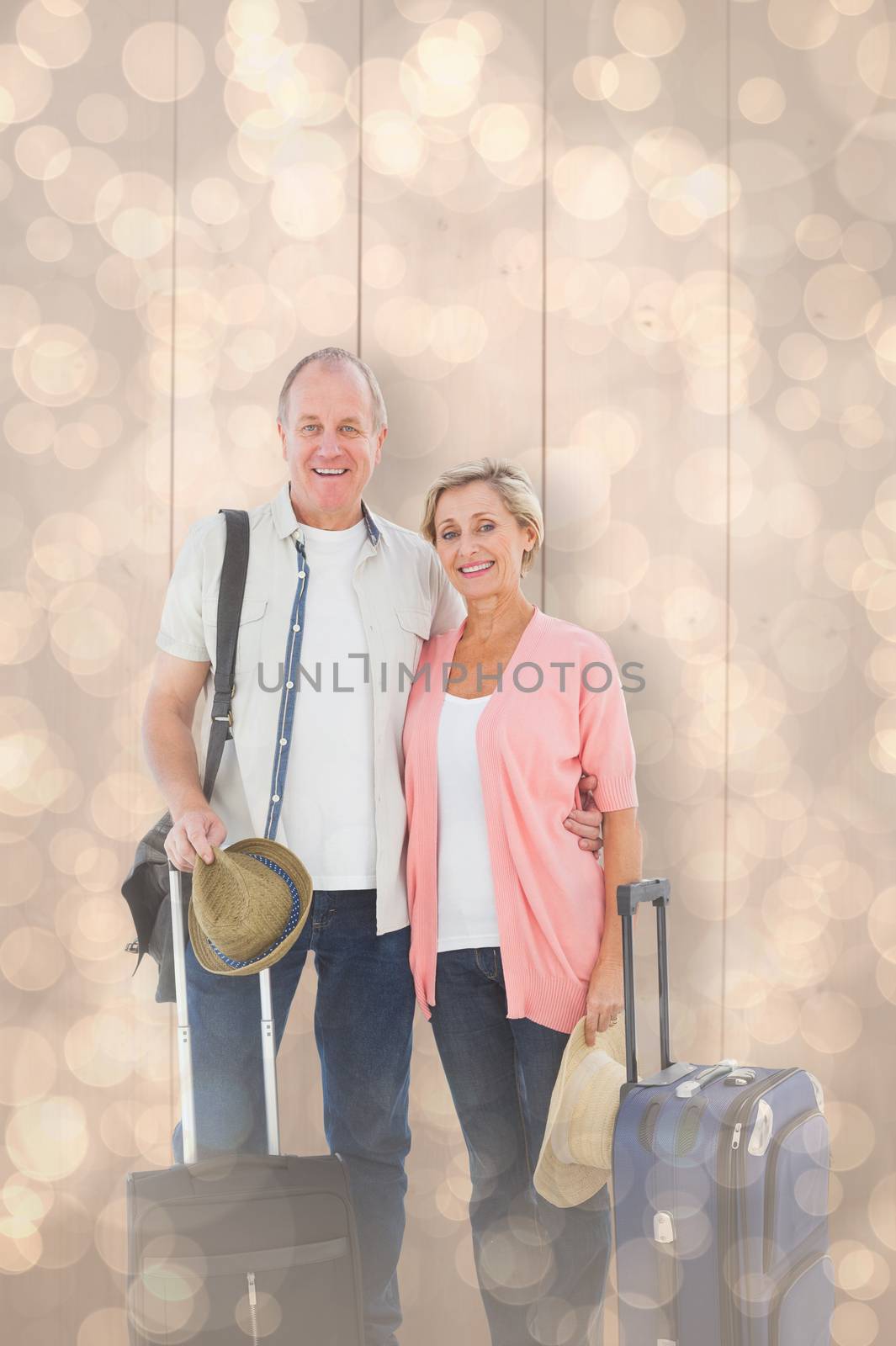 Composite image of smiling older couple going on their holidays by Wavebreakmedia