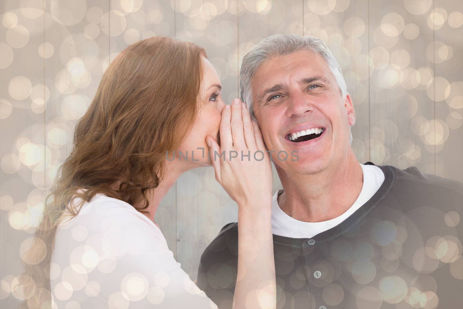 Woman telling secret to her partner against light glowing dots design pattern