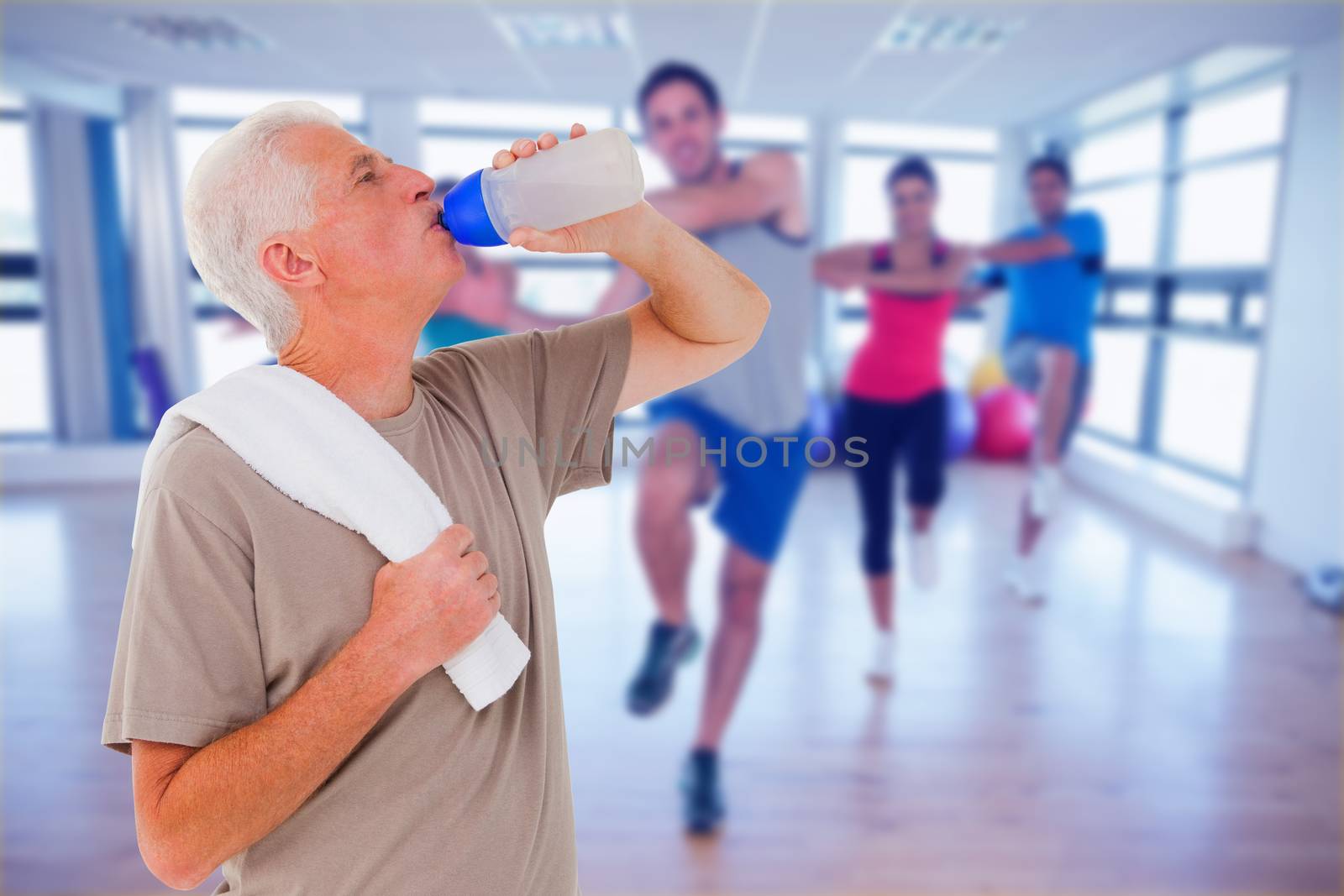 Composite image of senior man drinking from water bottle