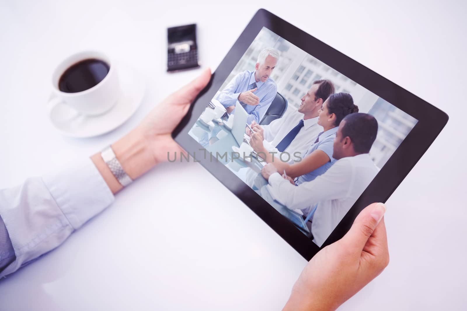 Composite image of man using tablet pc by Wavebreakmedia