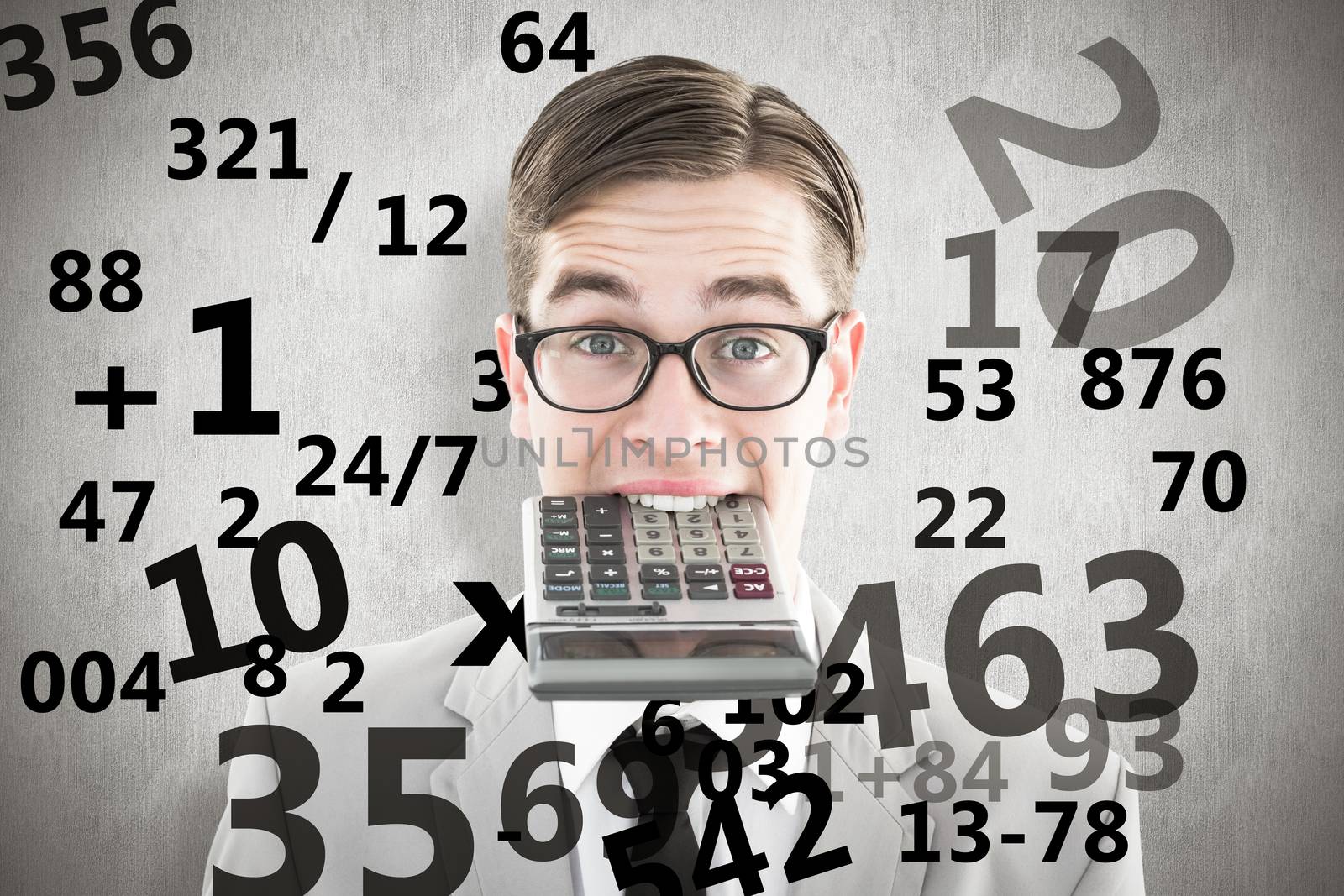 Composite image of geeky smiling businessman biting calculator by Wavebreakmedia