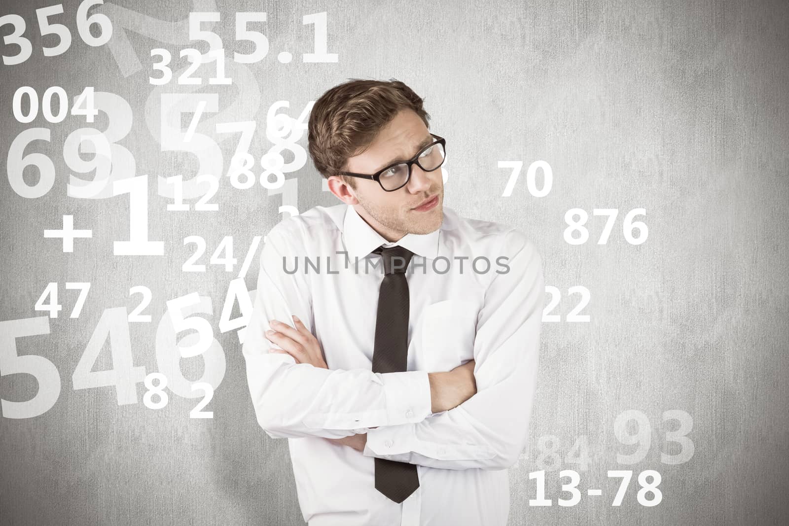 Composite image of young businessman thinking with arms crossed by Wavebreakmedia
