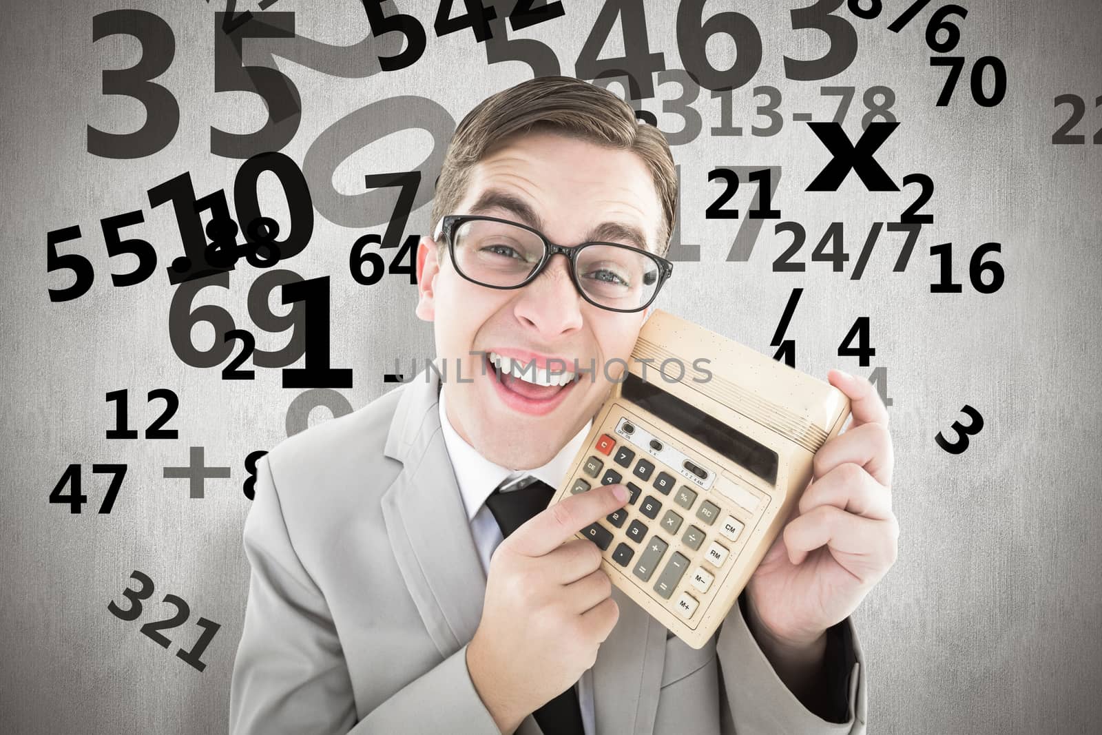 Geeky smiling businessman showing calculator against white background