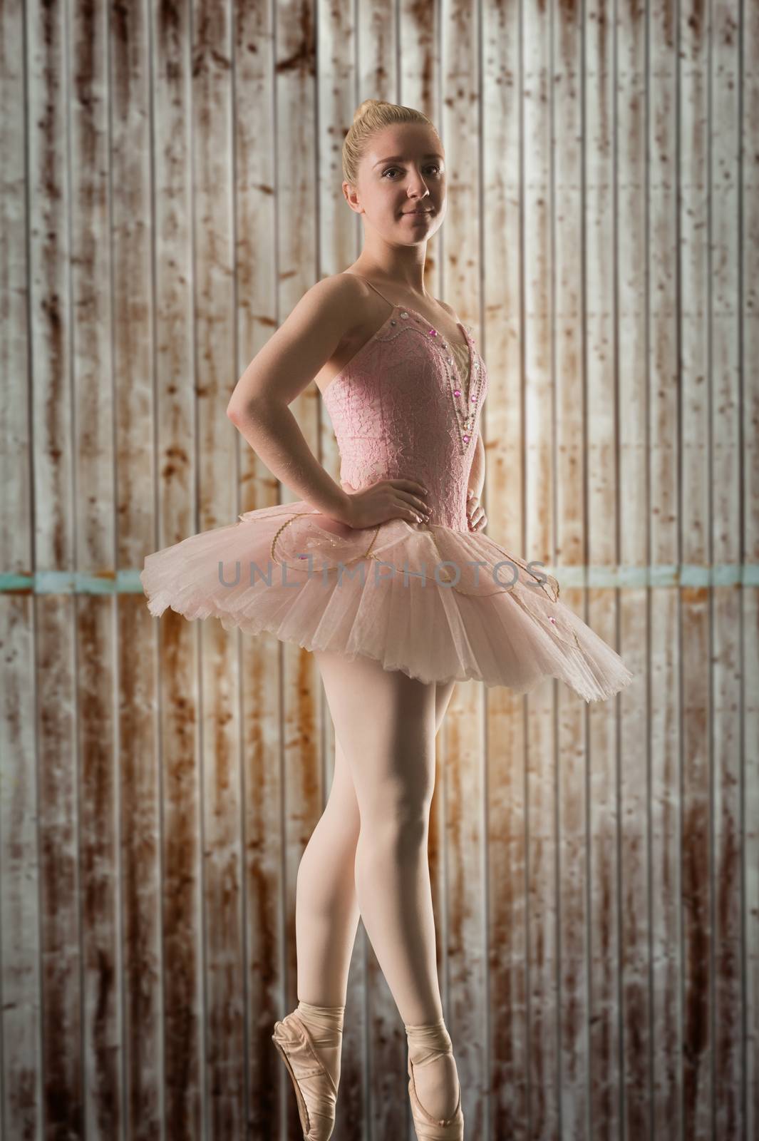 Composite image of pretty ballerina dancing by Wavebreakmedia