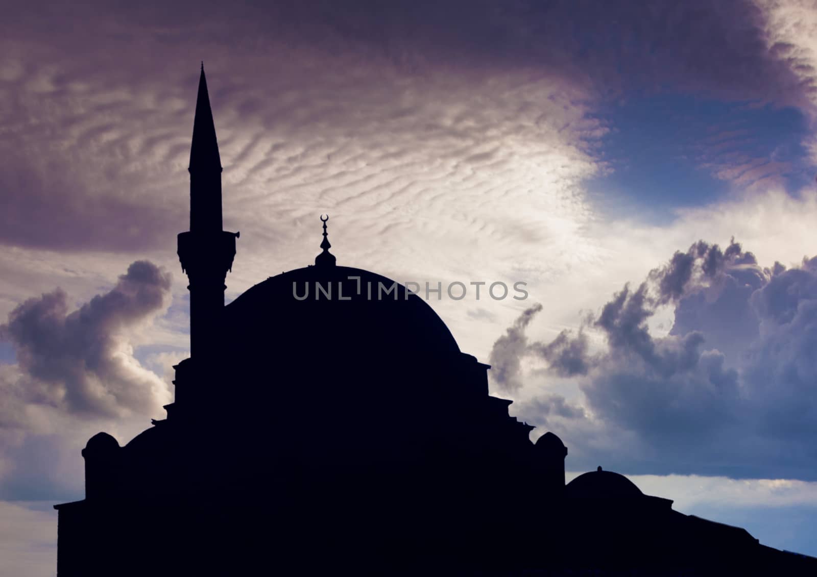 Blue mosque silhouette against a setting sun, Istanbul, Turkey