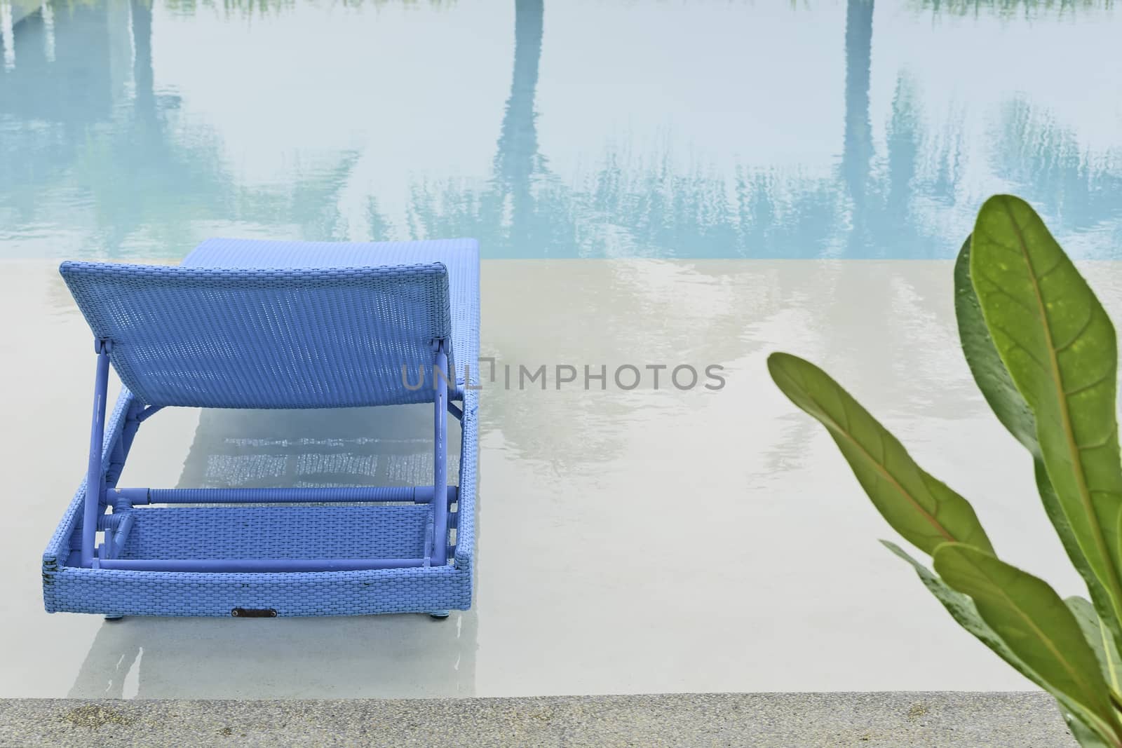 Turquoise pool bench in Philippine hotel