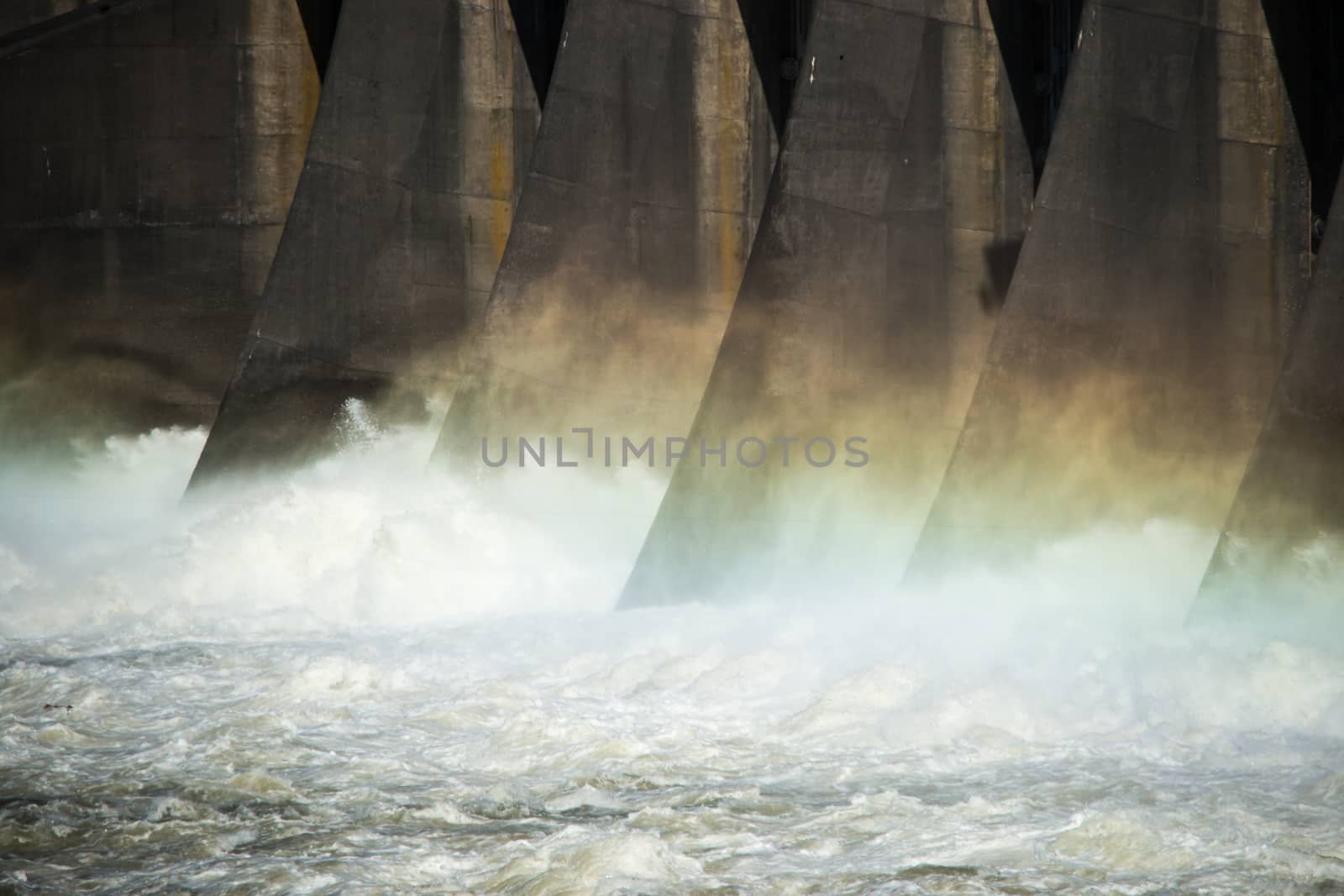 Close in photo of a hydroelectric dam producing clean renewable energy.