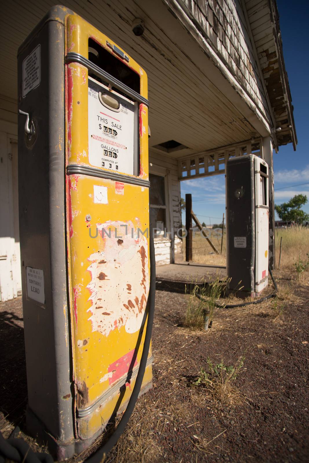 Photo of two old defunct gas pumps located near a ghost town in Oregon.