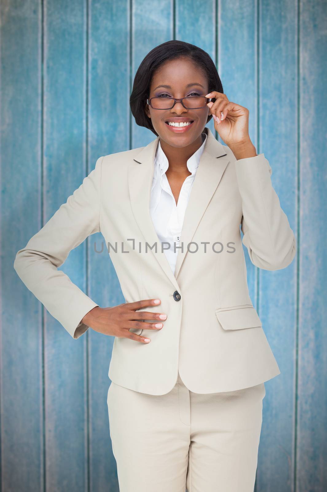 Composite image of thinking businesswoman by Wavebreakmedia