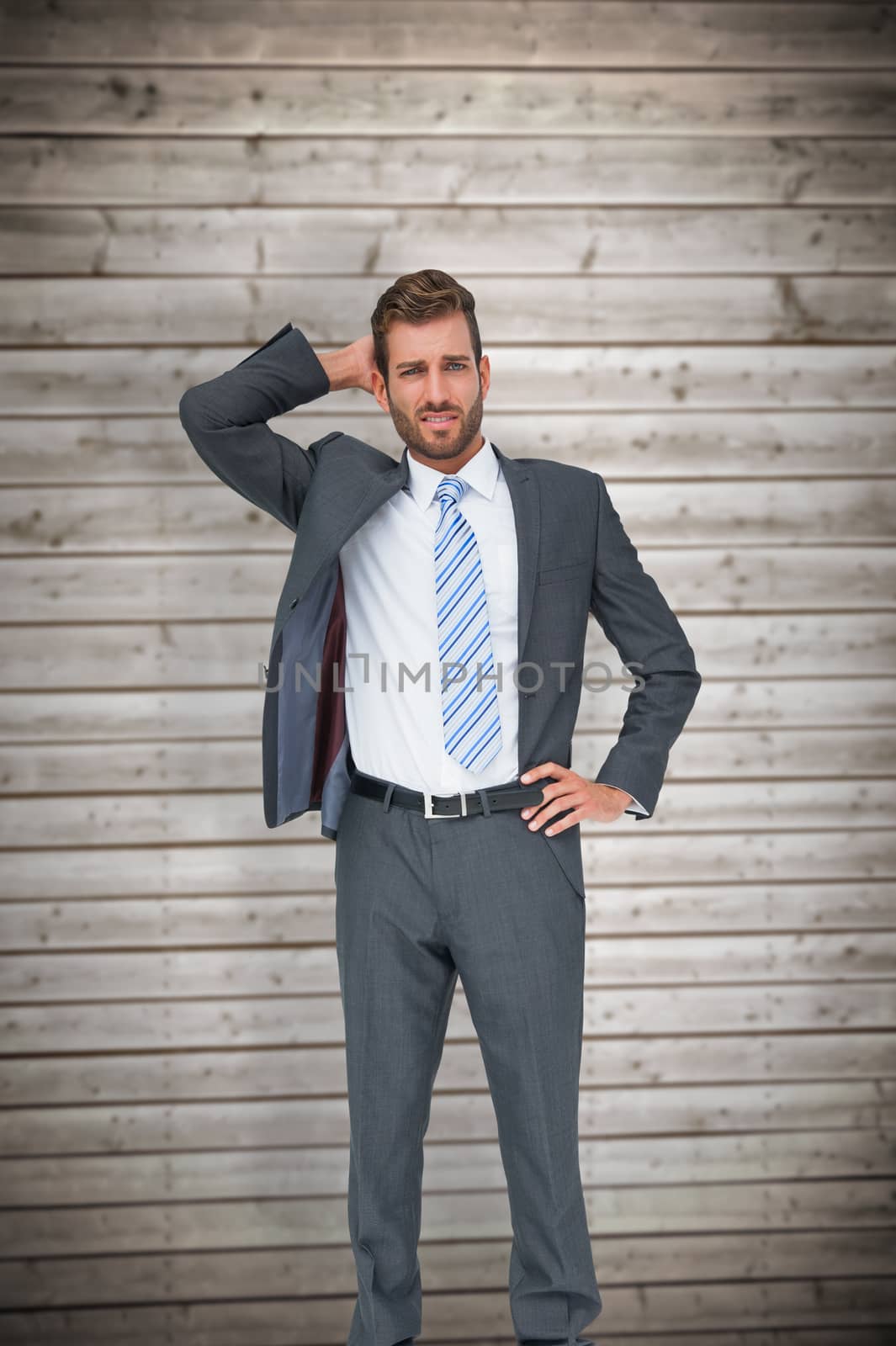 Composite image of thinking businessman by Wavebreakmedia