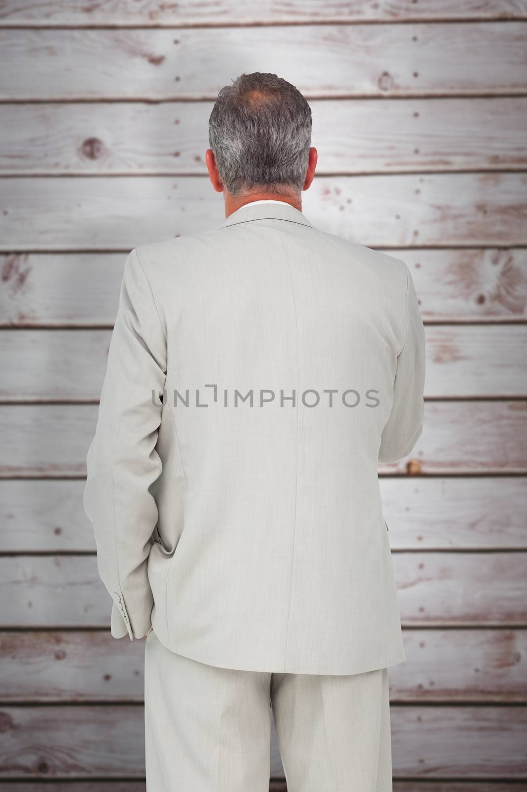 Composite image of thinking businessman by Wavebreakmedia