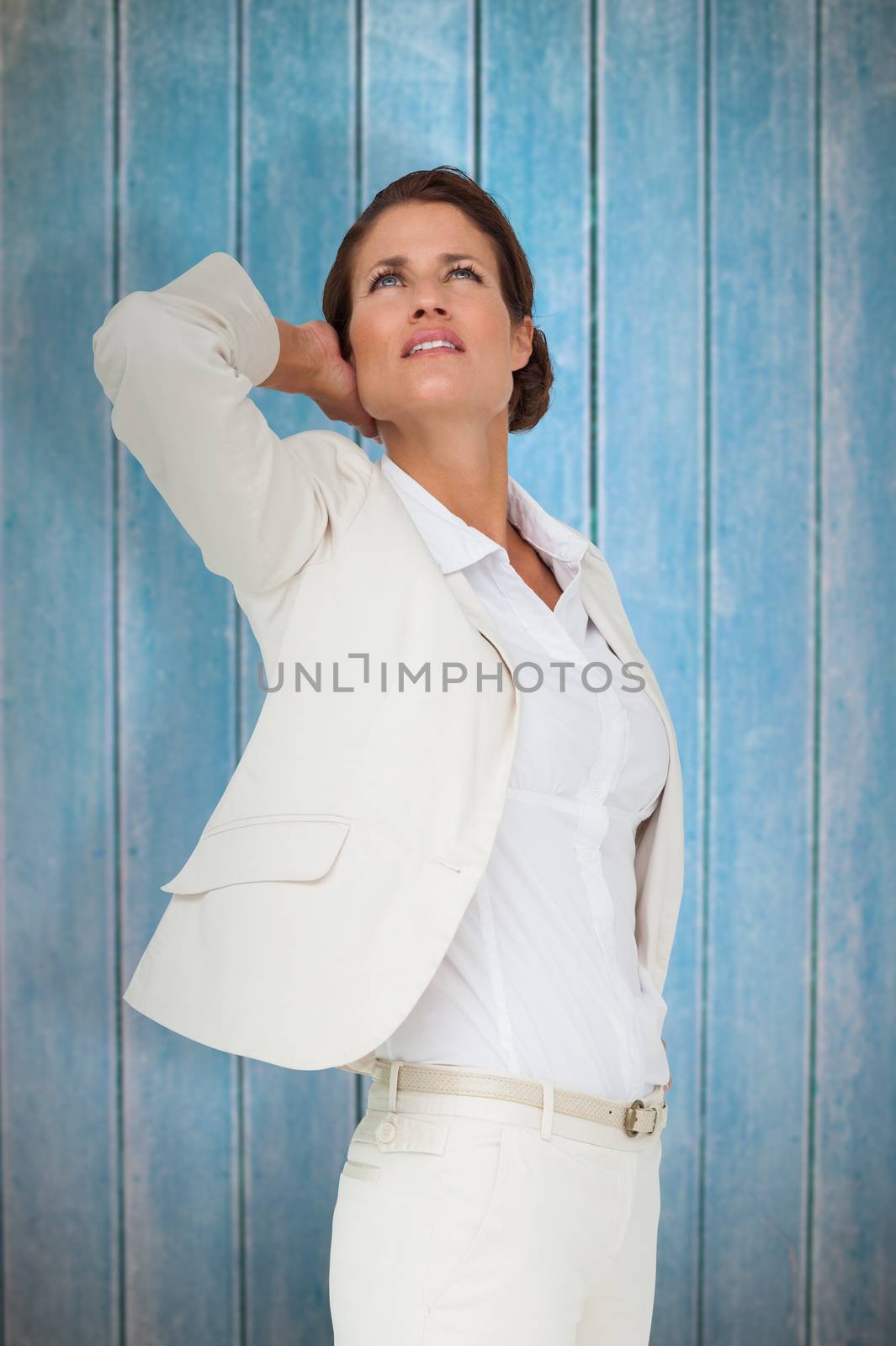 Composite image of thinking businesswoman by Wavebreakmedia