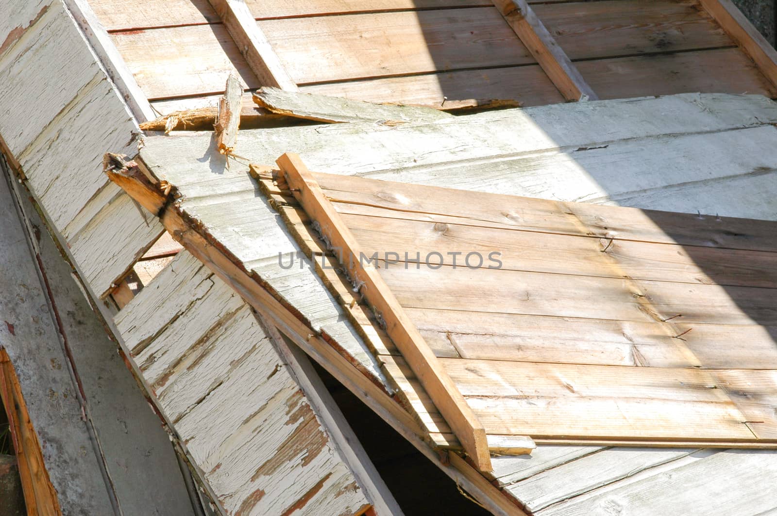 broken wood panels from a demolished shack