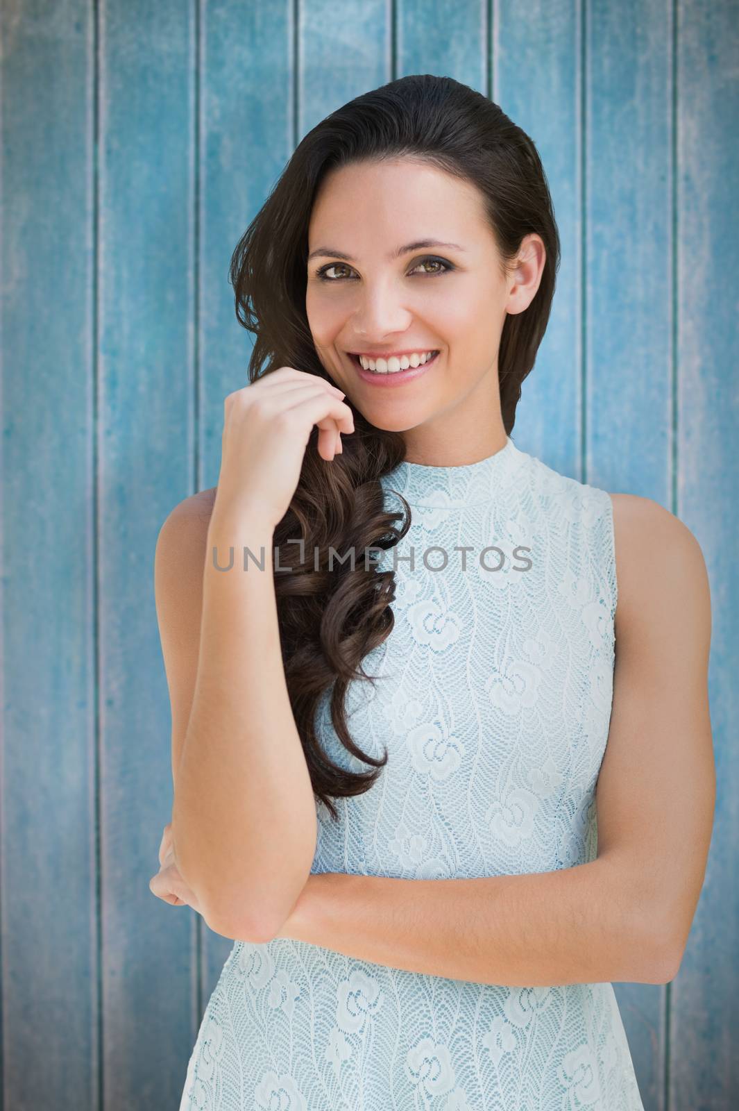 Stylish brunette against wooden planks