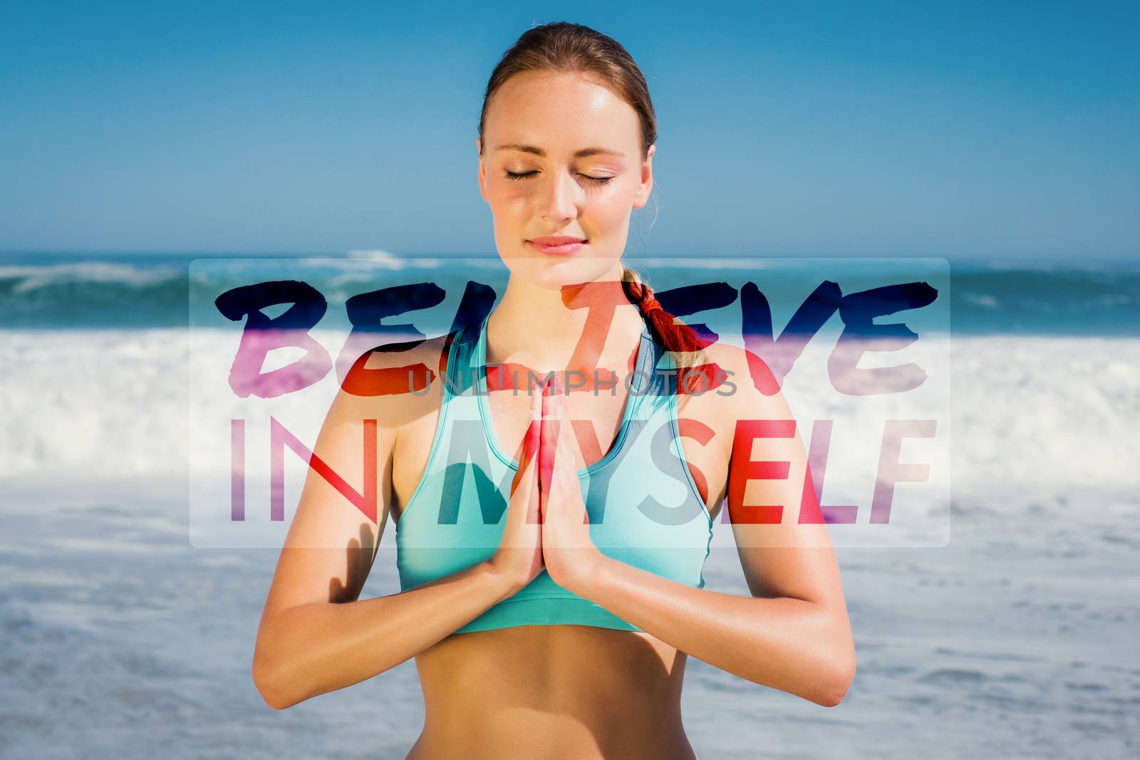 Composite image of fit woman meditating on the beach by Wavebreakmedia