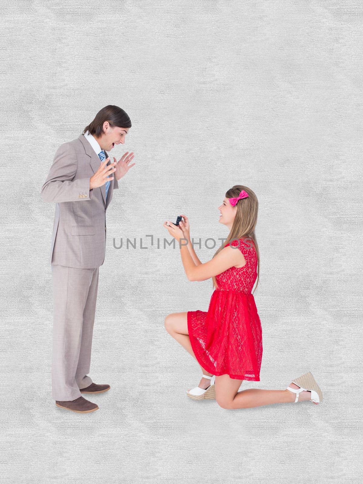 Composite image of pretty hipster on bended knee doing a marriage proposal to her boyfriend by Wavebreakmedia