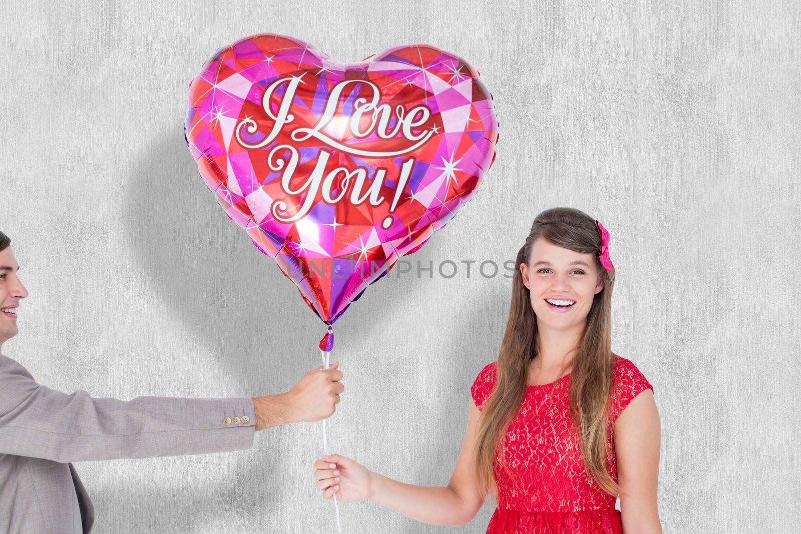 Geeky hipster offering red heart shape balloon to his girlfriend against white background