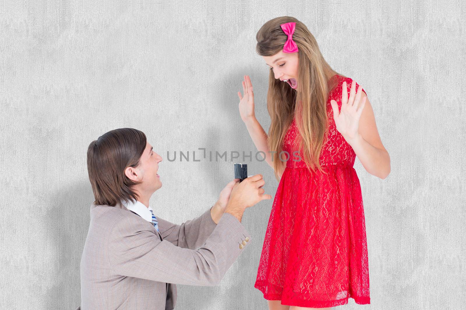 Composite image of hipster on bended knee doing a marriage proposal to his girlfriend  by Wavebreakmedia