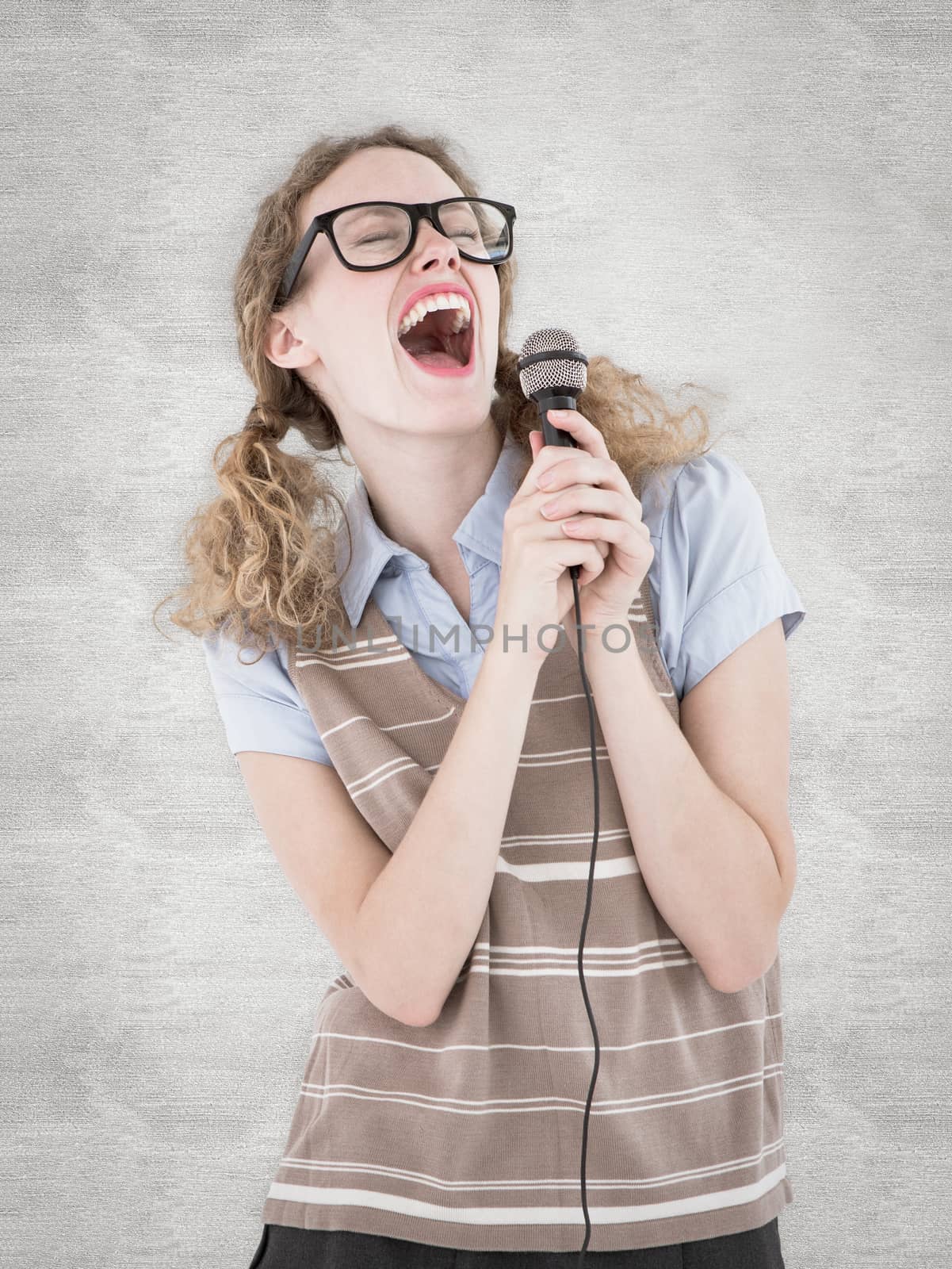 Geeky hipster woman singing into a microphone  against white background