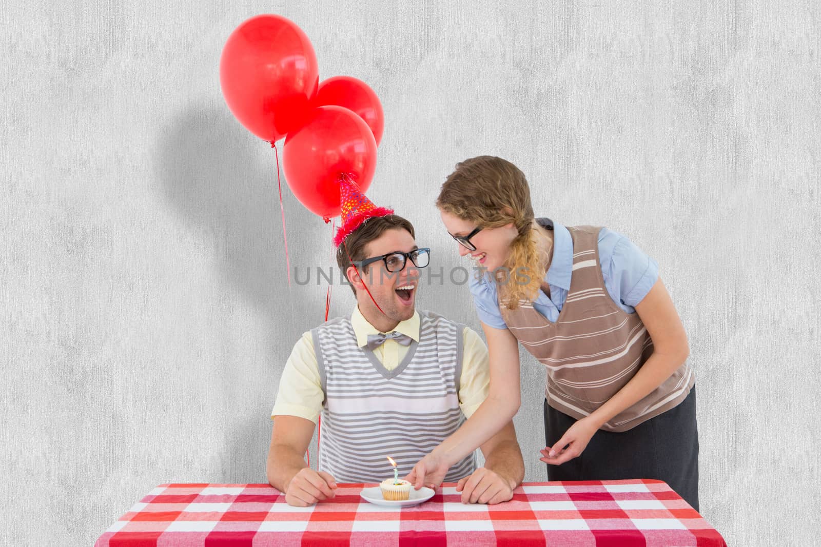 Geeky hipster couple celebrating his birthday  against white background