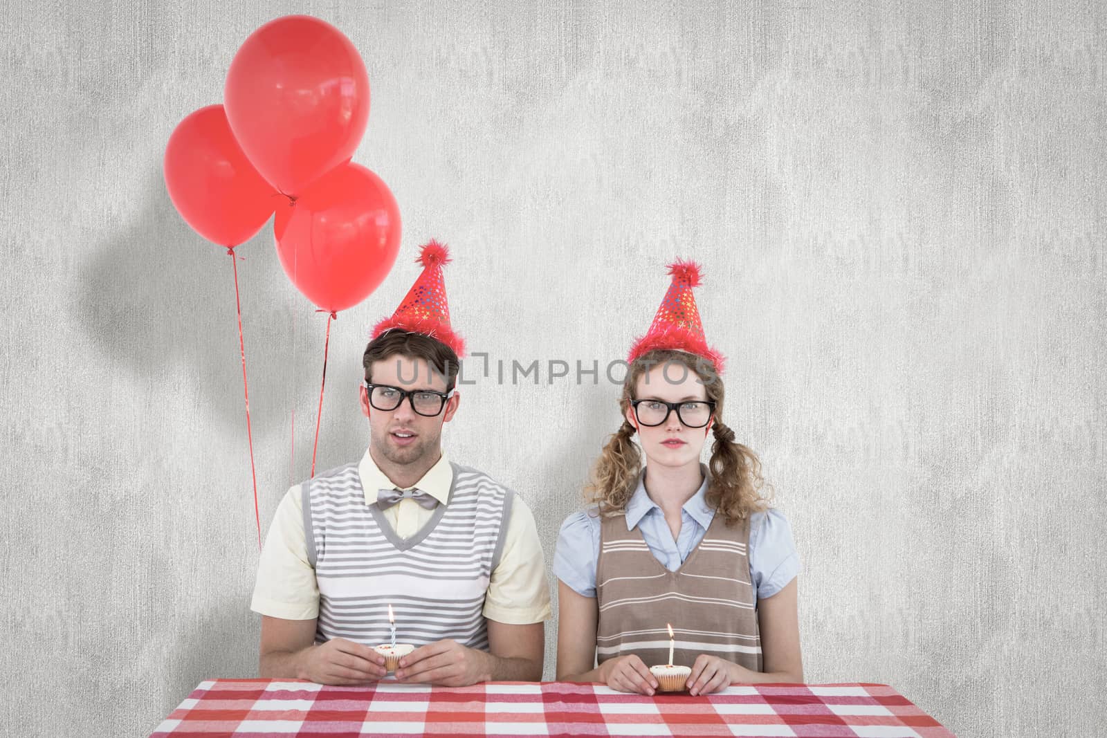 Geeky hipster couple celebrating his birthday  against white background