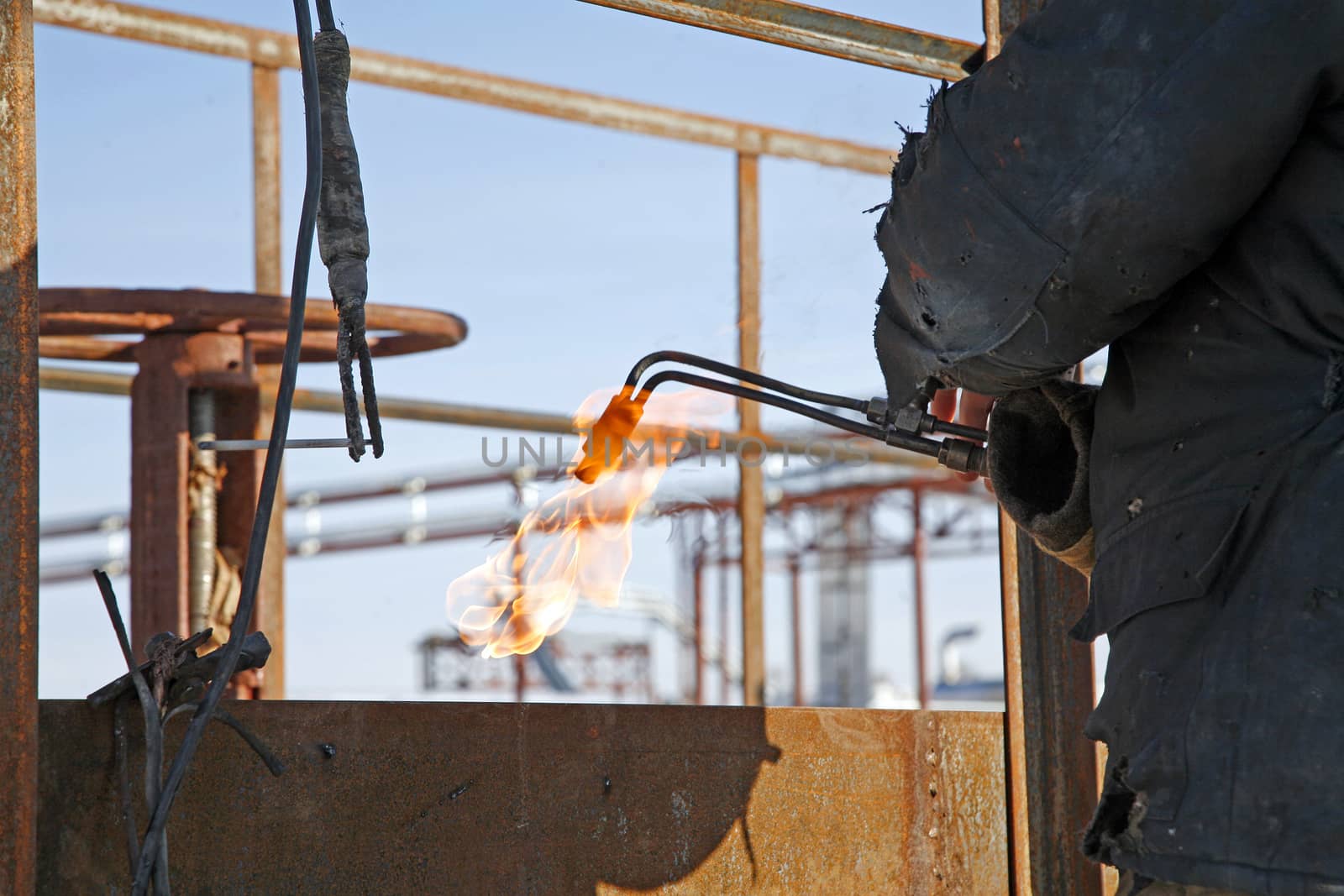 Industrial worker use acetylene torch