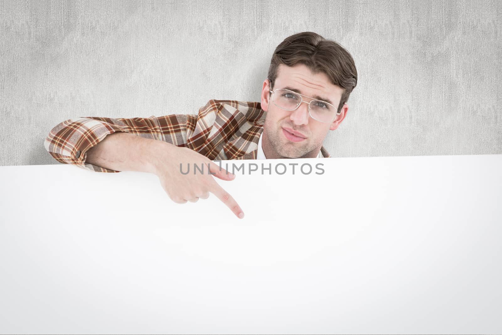 Geeky hipster pointing card against white background