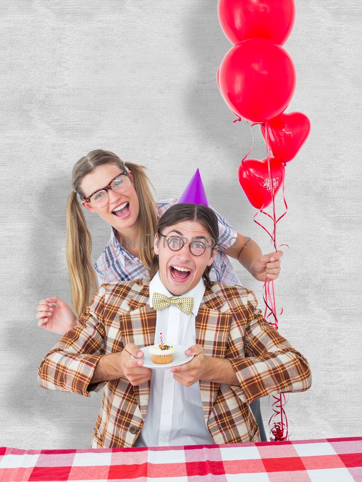 Geeky hipsters celebrating birthday  against white background