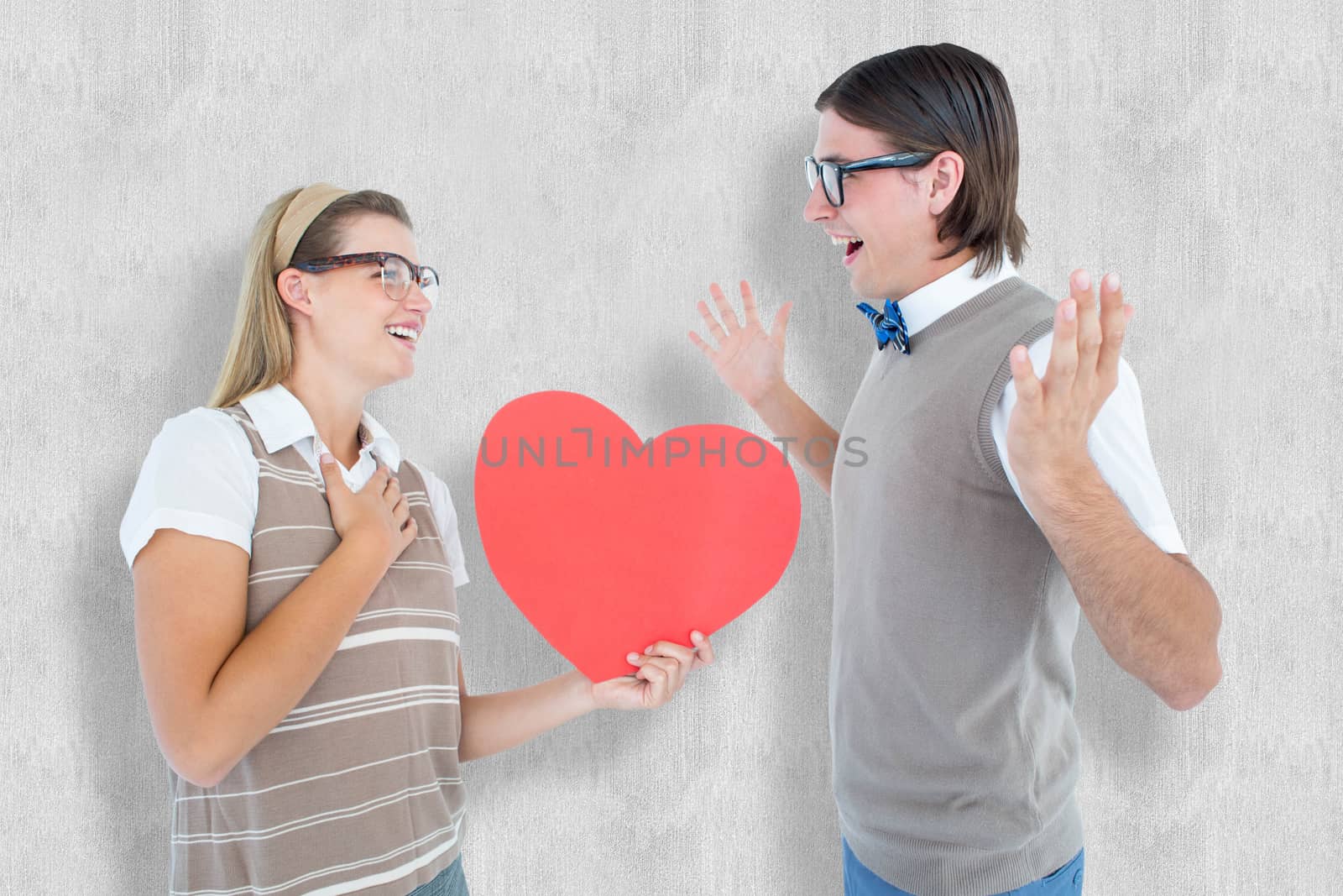 Happy geeky hipster and her boyfriend against white background