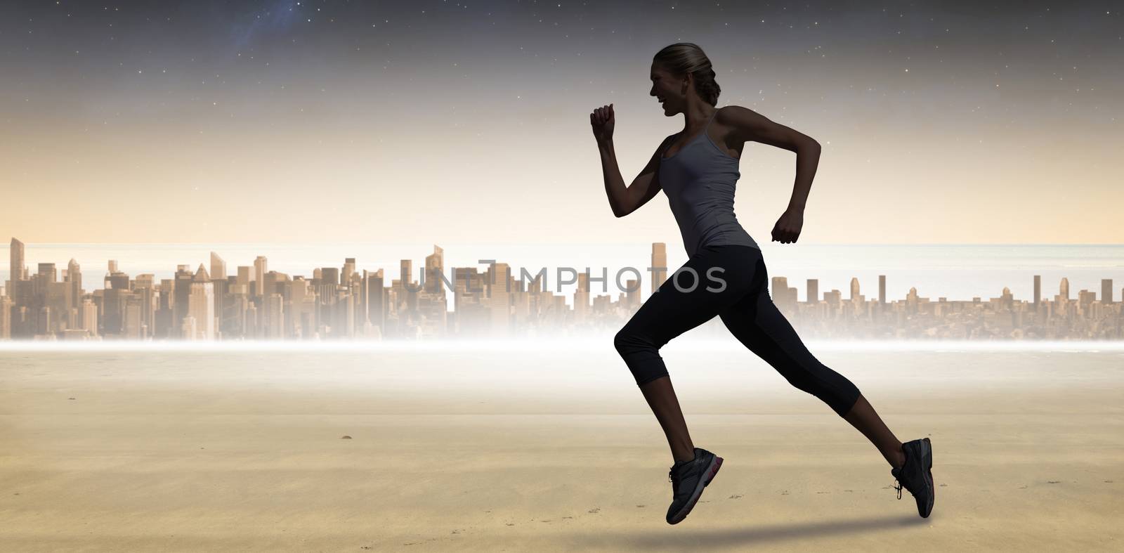 Pretty fit blonde jogging  against sun shining over city