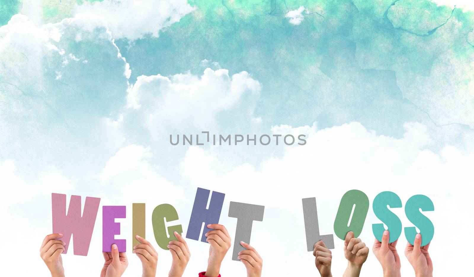 Composite image of hands holding up weight loss by Wavebreakmedia
